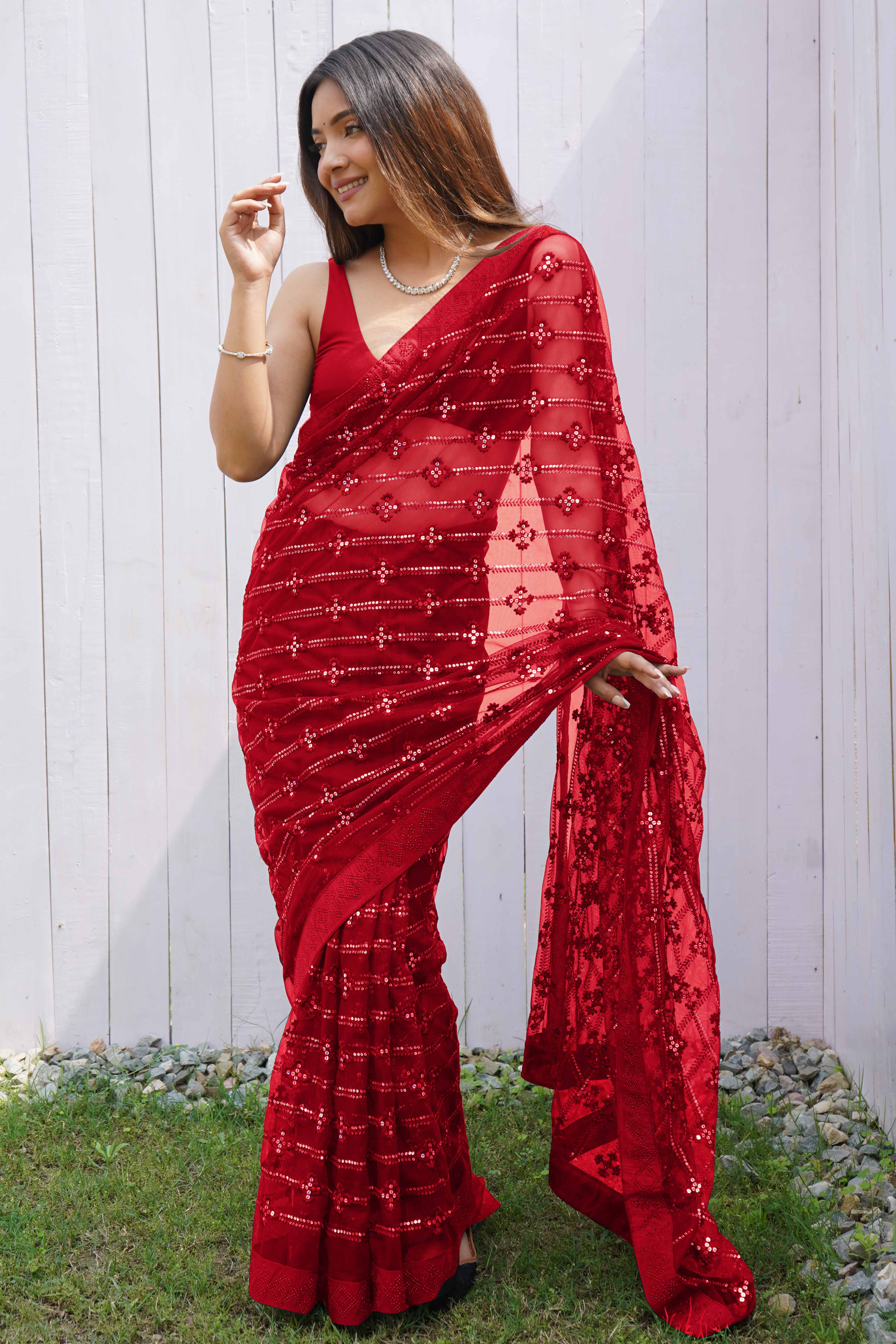 Red Net Saree Featuring Intricate Thread & Sequins Work With A Luxe Diamond Border