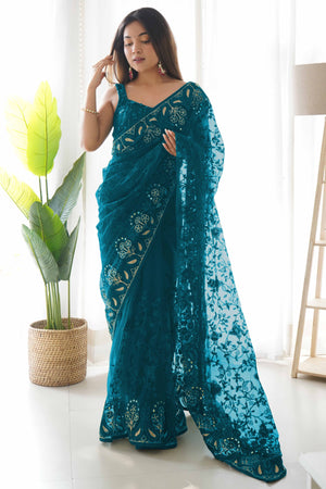 Teal Net Saree With Floral Thread Embroidery Adorned In Stone & Mirror Accents
