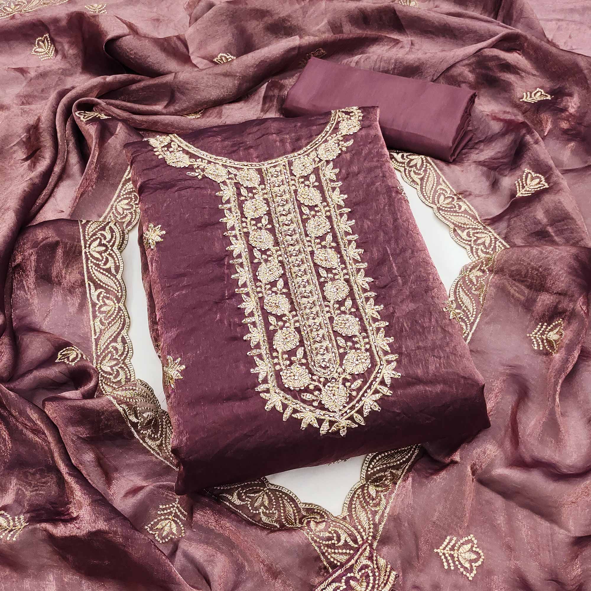 Purple Satin Dress Material Featuring Exquisite Floral Embroidery With Detailed Handwork Accents