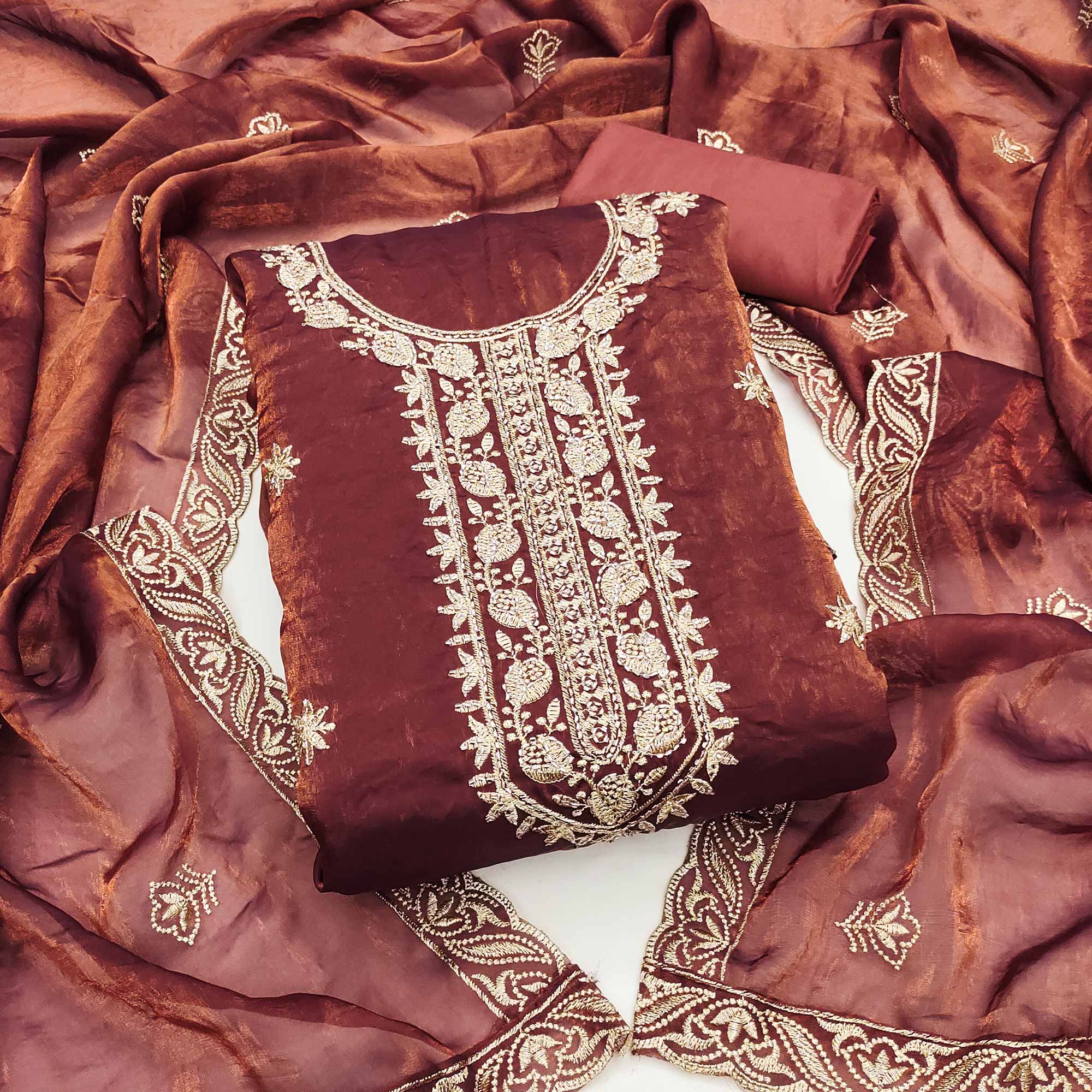 Rust Satin Dress Material Featuring Exquisite Floral Embroidery With Detailed Handwork Accents