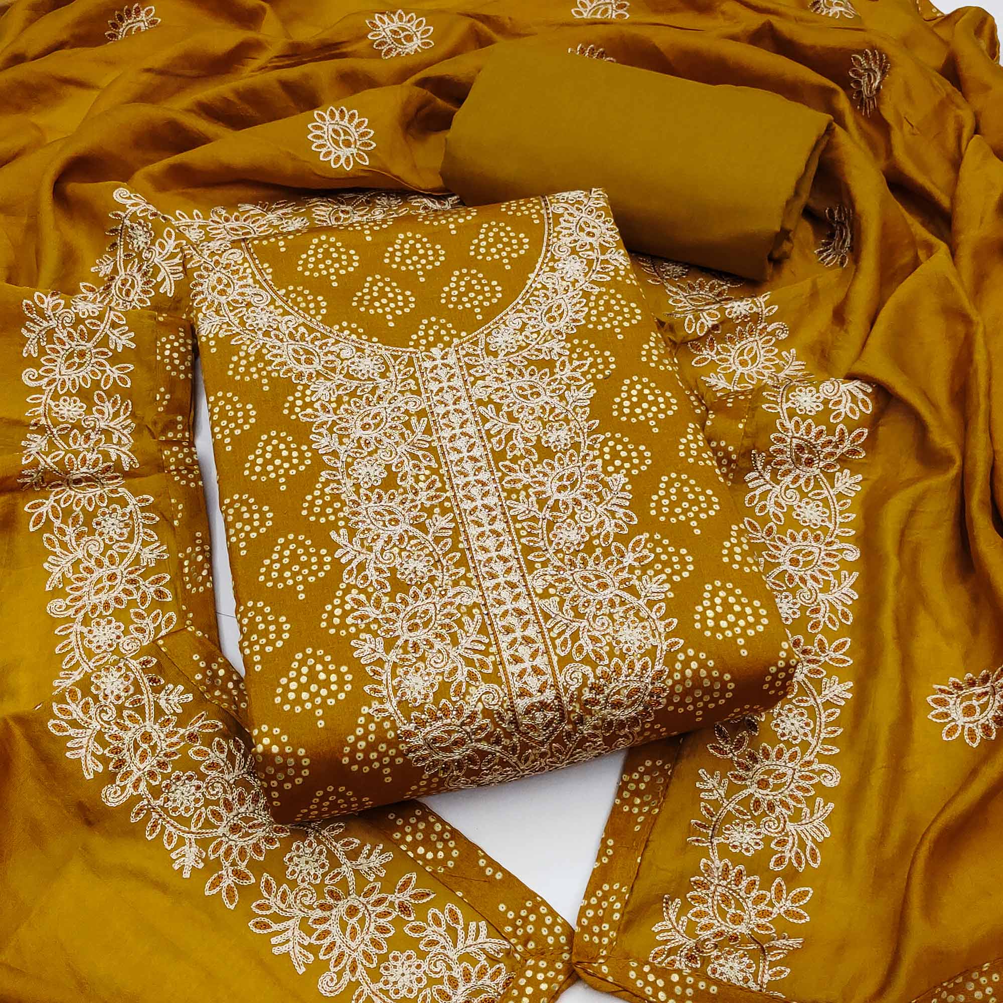 Mustard Bandhani Print Cotton Dress Material Accented with Embroidered Neckline