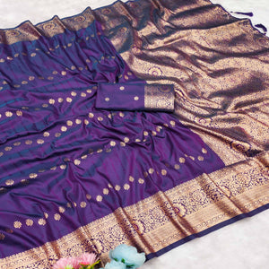 Violet Zari-Woven Cotton Silk Saree Featuring a Graceful Drape and Delicate Tassel Detailing