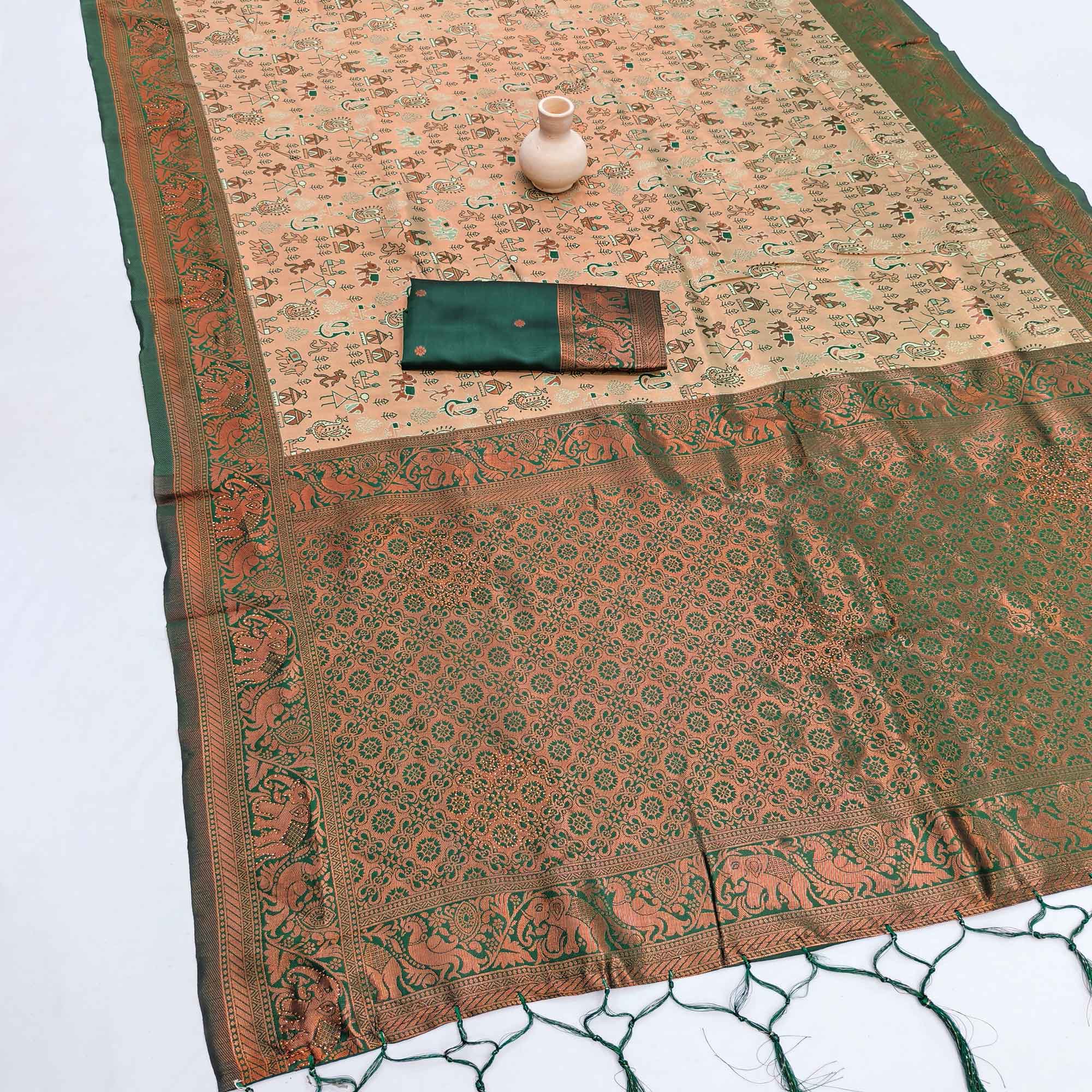 Green Classic Tissue Silk Saree Highlighted with Fine Zari Woven Motifs