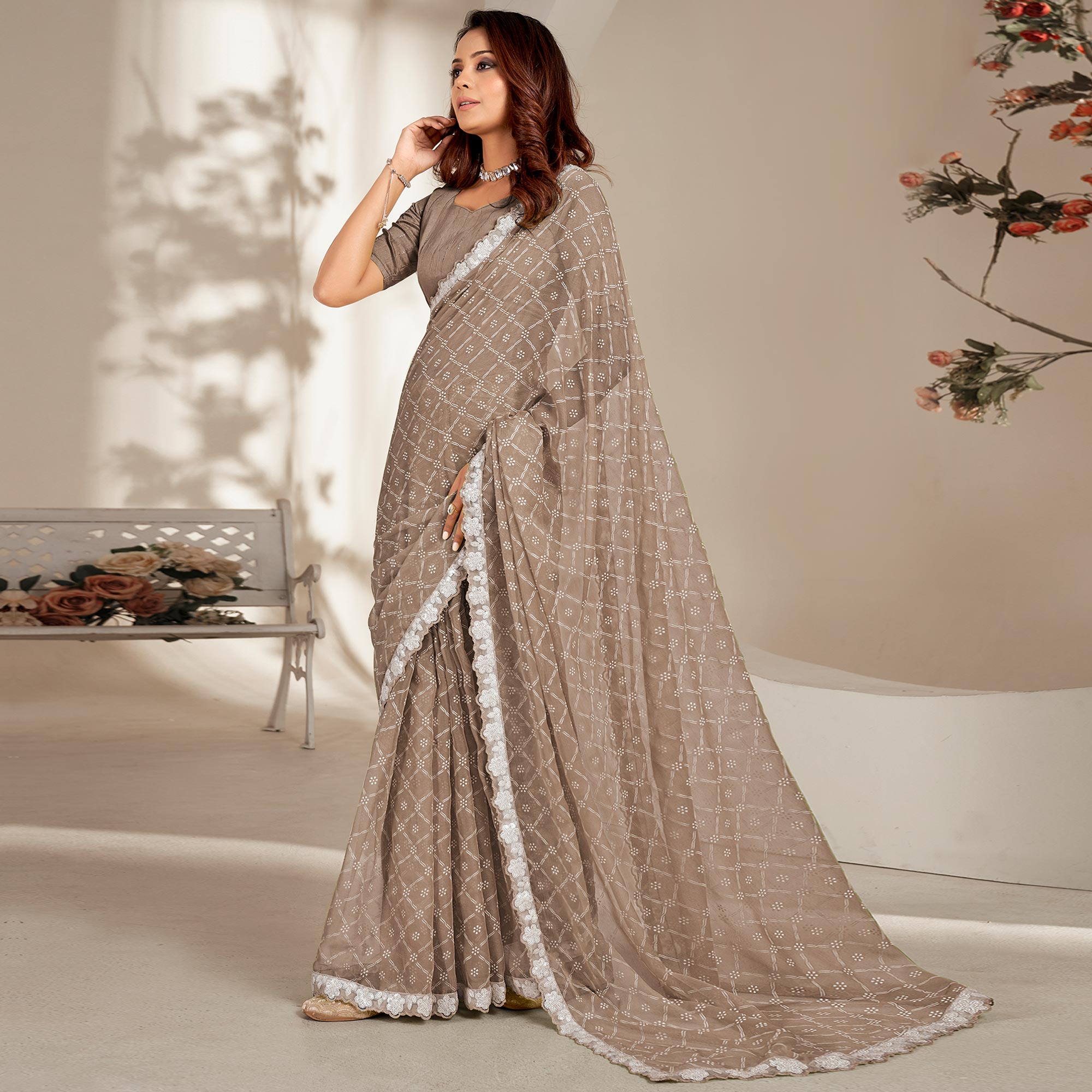 Brown Floral Printed Chiffon Saree With Embroidered Border