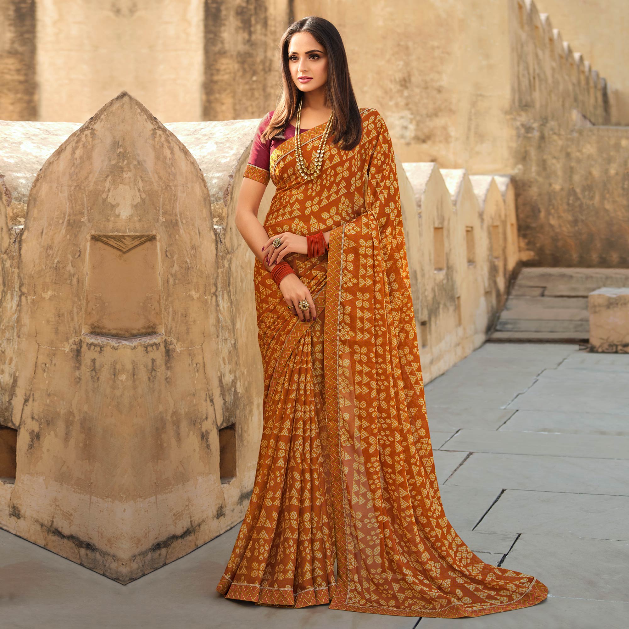 Mustard Printed With Embroidered Border Georgette Saree