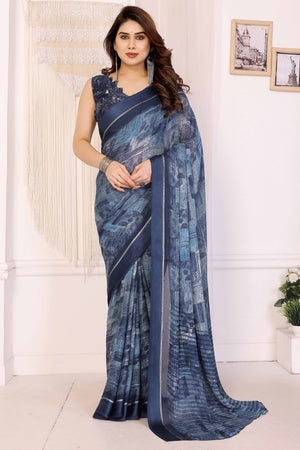 Trendy Blue Moss Crepe Saree with Floral Motifs and Satin Border