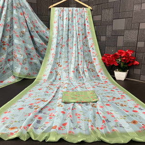 Sky Blue Bloom Floral Digital Printed Georgette Saree Accentuated With Graceful Zari Stripes