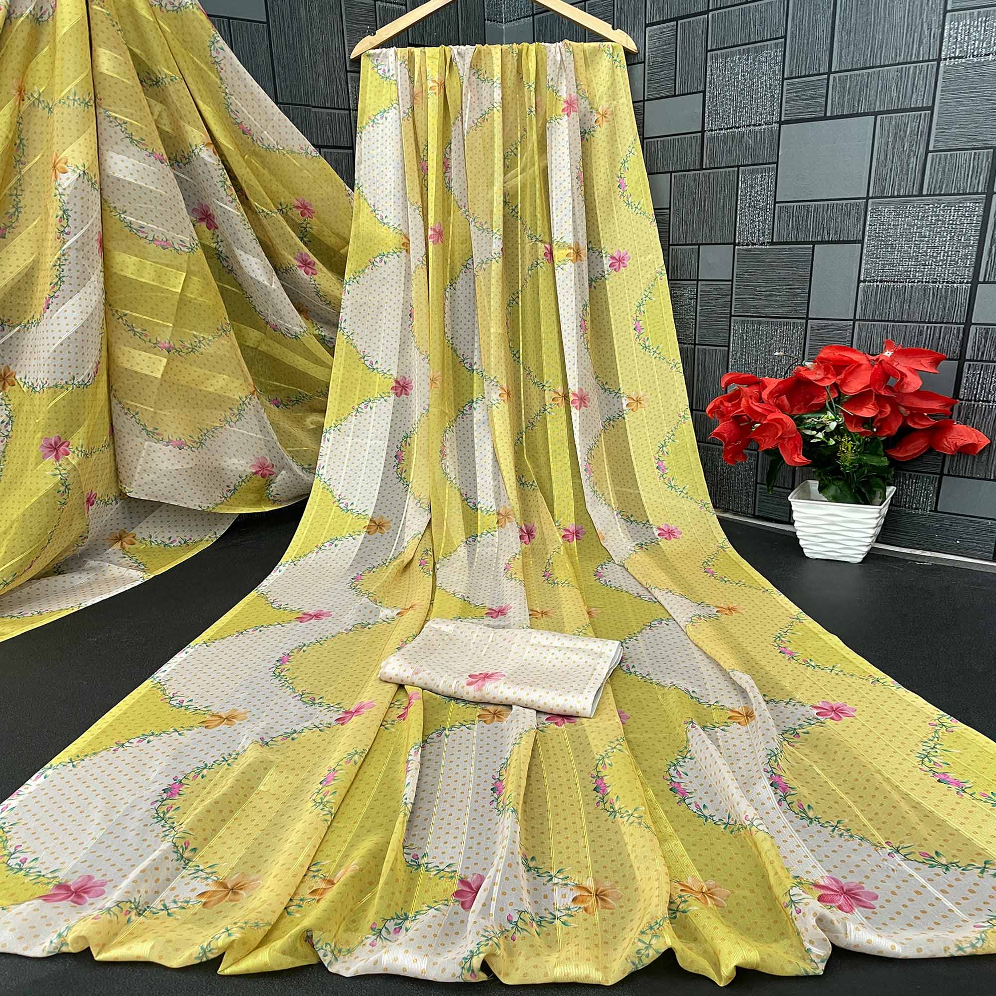 Lemon Yellow Bloom Floral Digital Printed Georgette Saree Accentuated With Graceful Zari Stripes