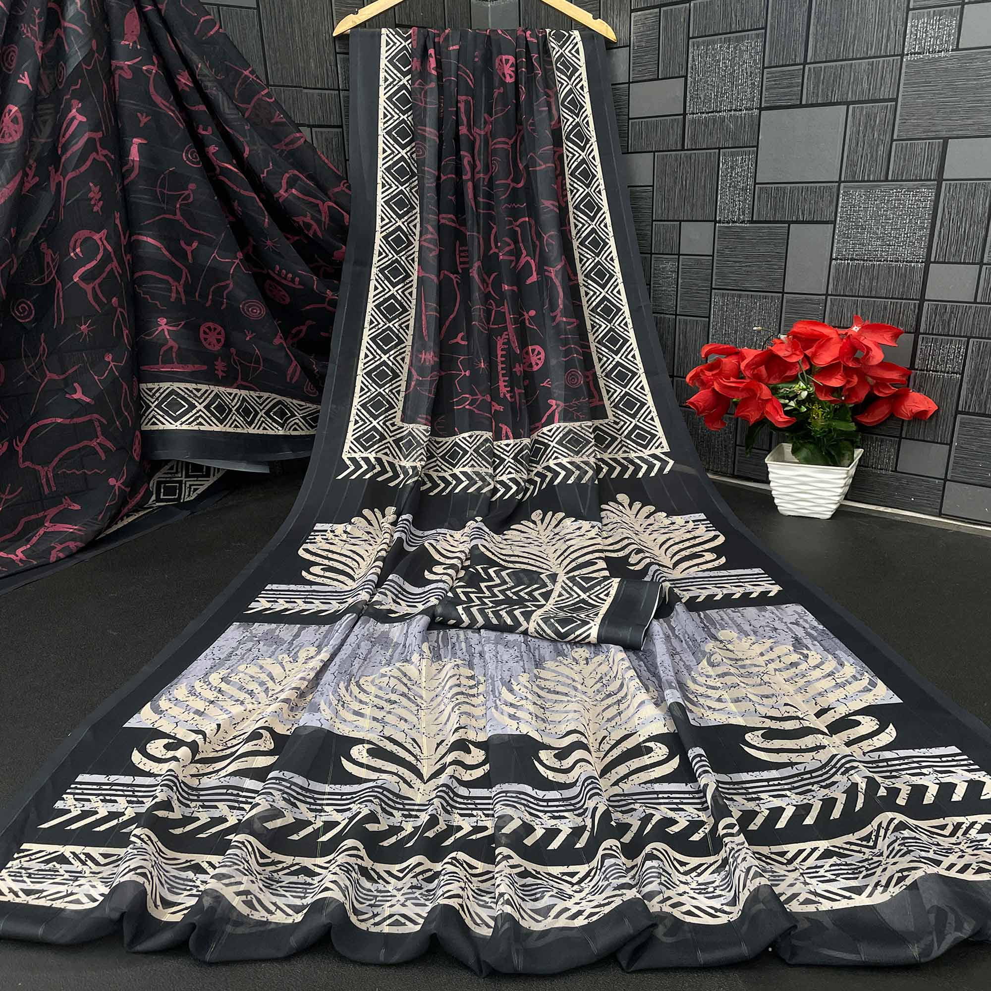 Charming Black Digital Printed Georgette Saree Accentuated With Zari Stripes