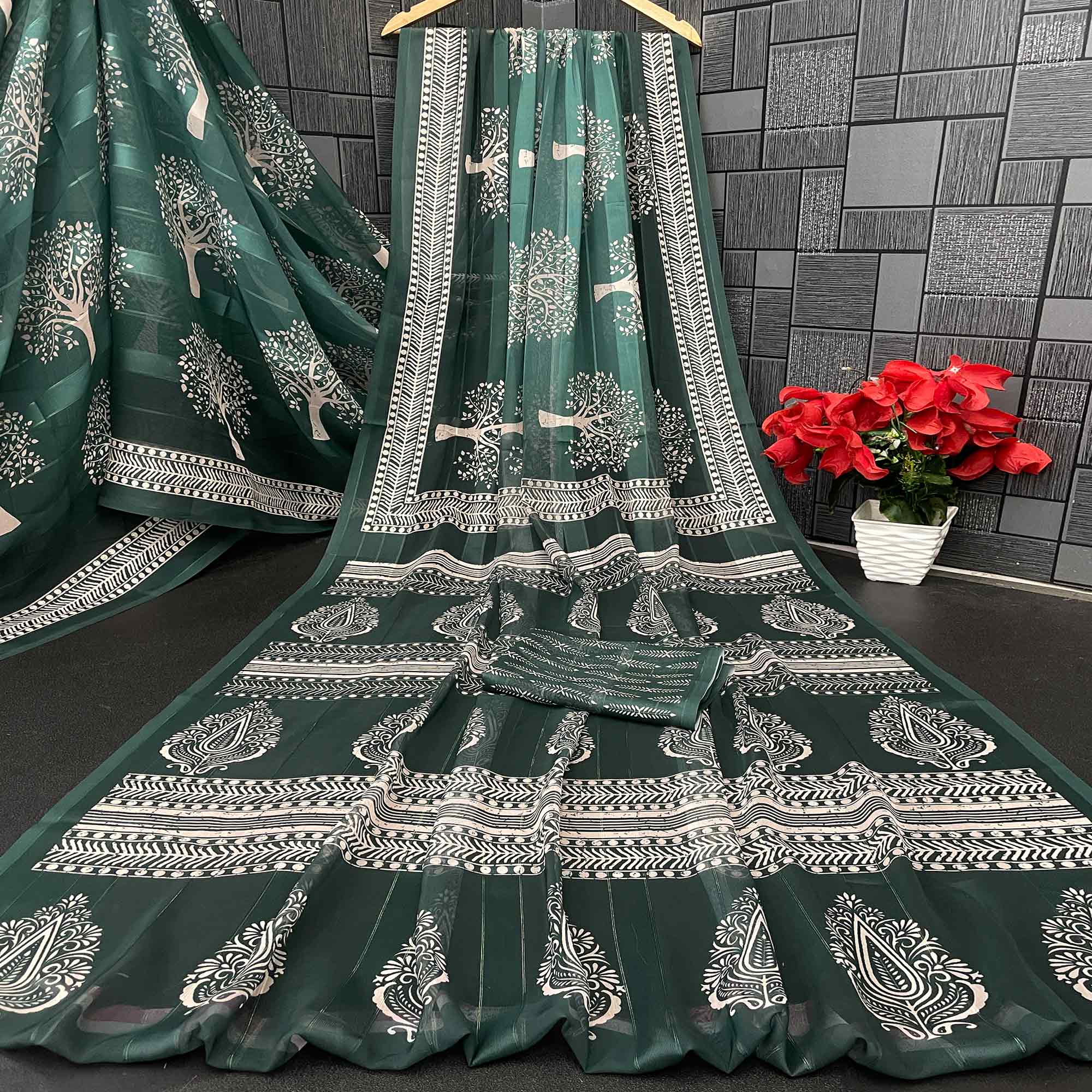Charming Green Digital Tree Printed Georgette Saree Accentuated With Zari Stripes