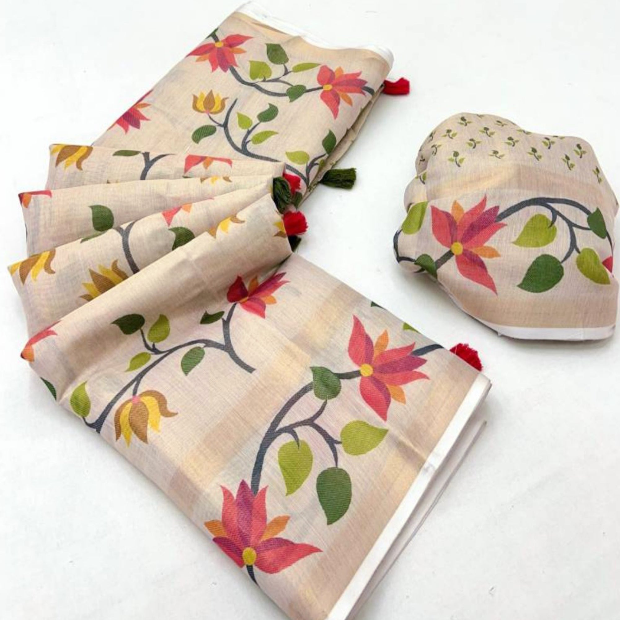 Grey Floral Printed Tissue Cotton Silk Saree Enhanced with a Classic Zari Weaving Border