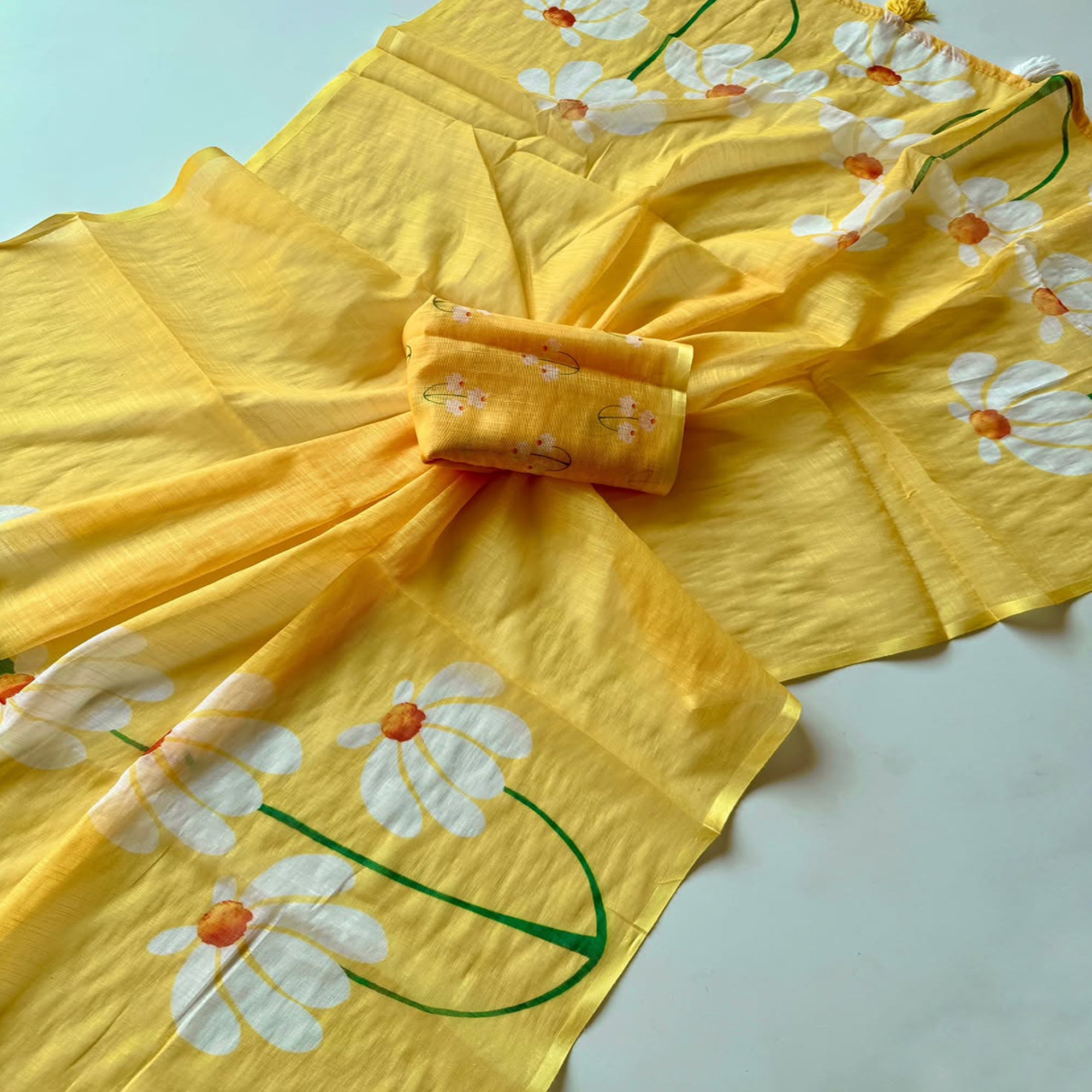 Graceful Yellow Linen Cotton Saree with Stylish Floral Prints for Effortless Elegance