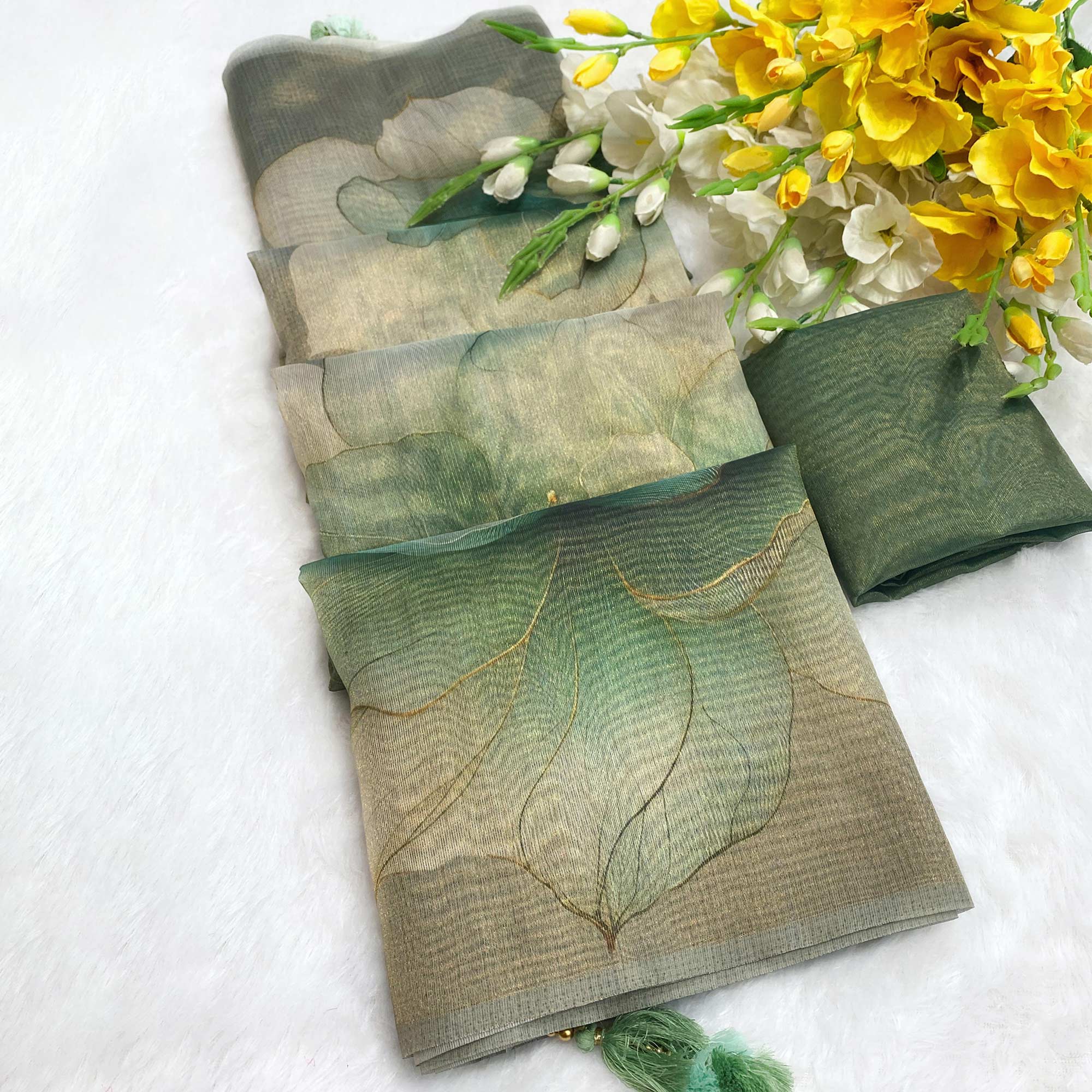 Sophisticated Dusty Green Floral Digital Print Tissue Saree Enhanced With Handmade Tassels