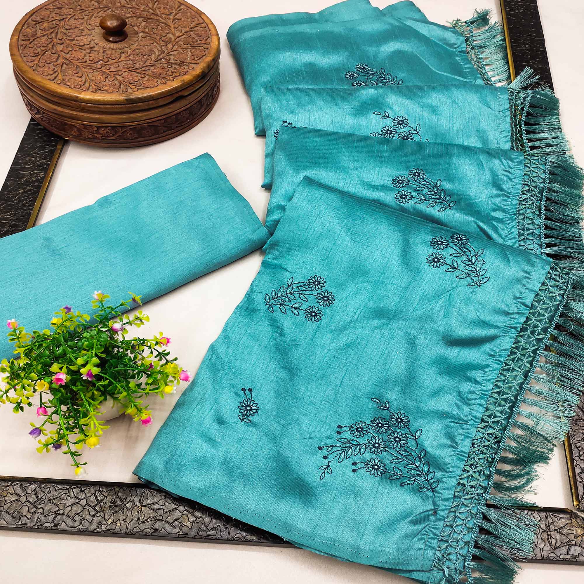 Aqua Blue Floral Embroidered Art Silk Saree With Tassels
