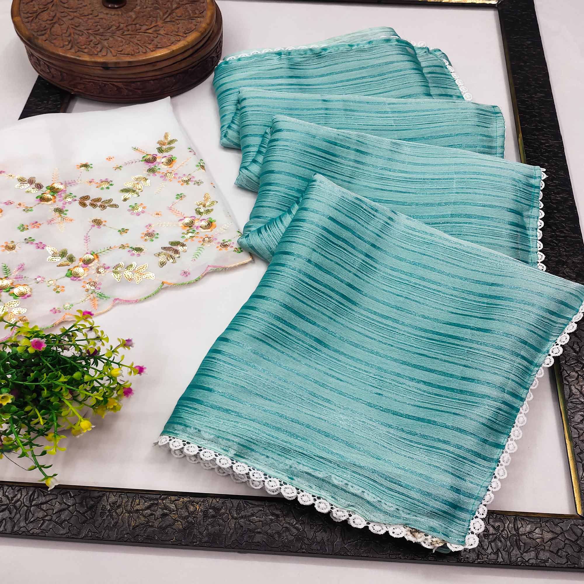 Turquoise Solid Woven Chiffon Saree With Lace Border