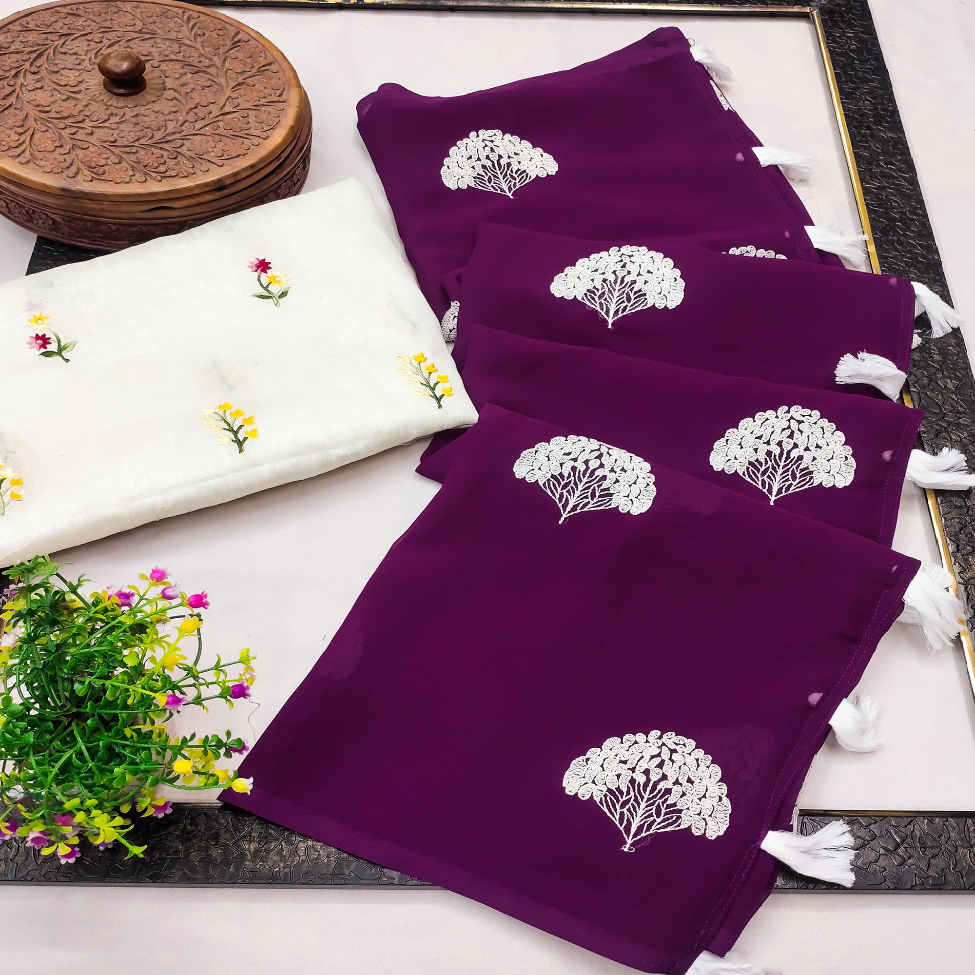 Dark Purple Thread Embroidered Georgette Saree With Tassels