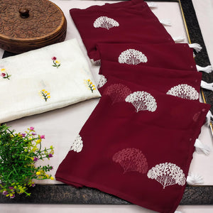 Maroon Thread Embroidered Georgette Saree With Tassels