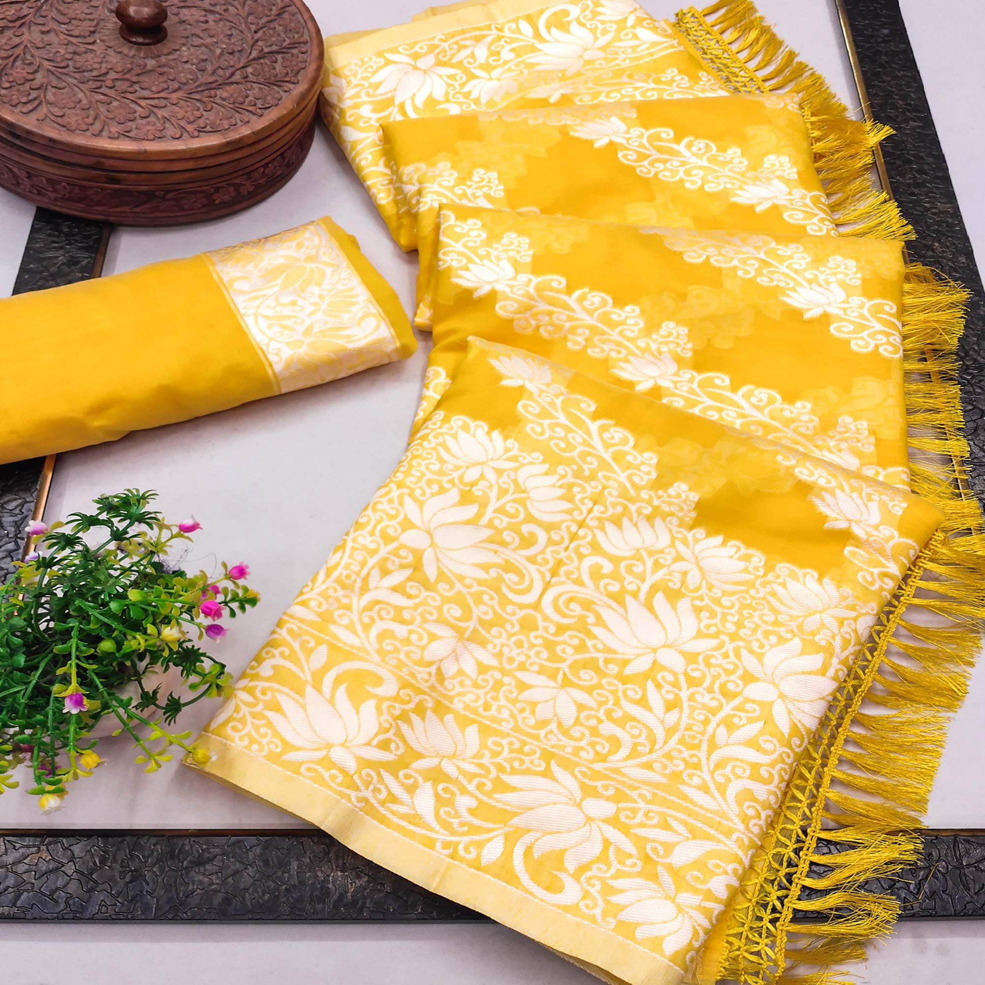Radiant Yellow Woven Silk Saree with Floral Accents
