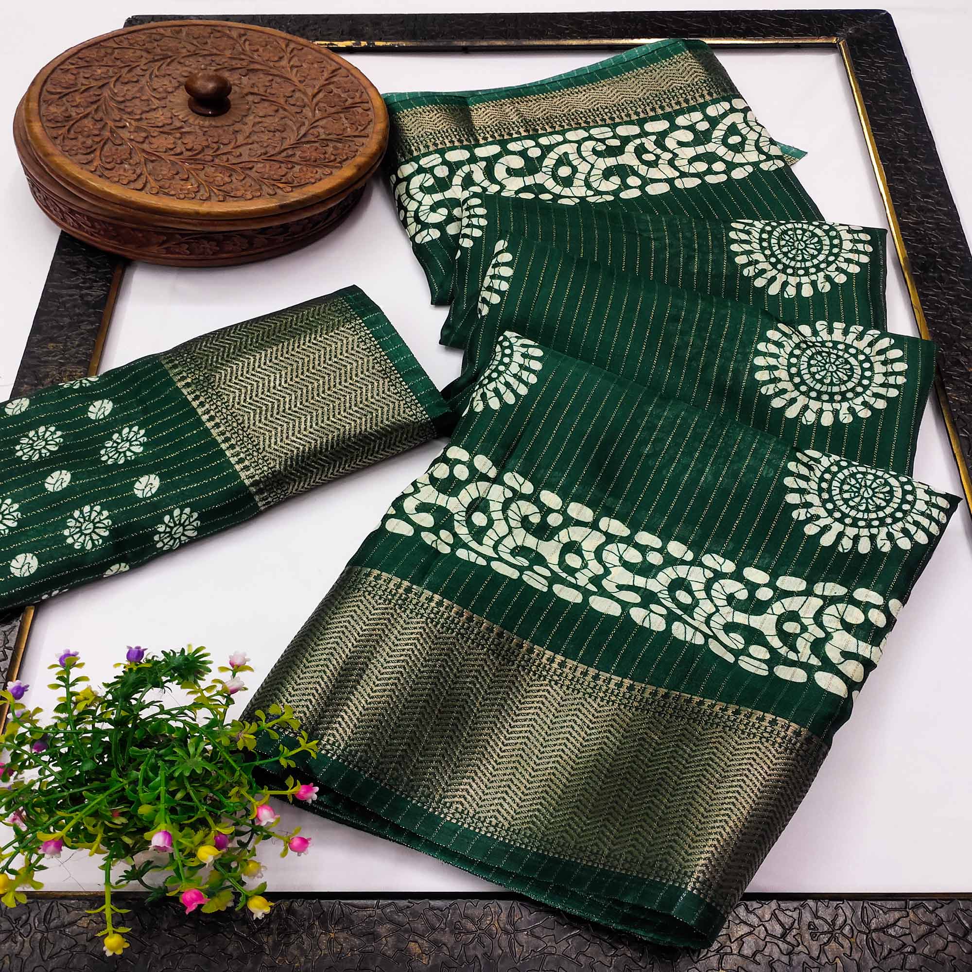 Classic Dark Green Dola Silk Saree Adorned with Floral Motifs & Rich Zari Work