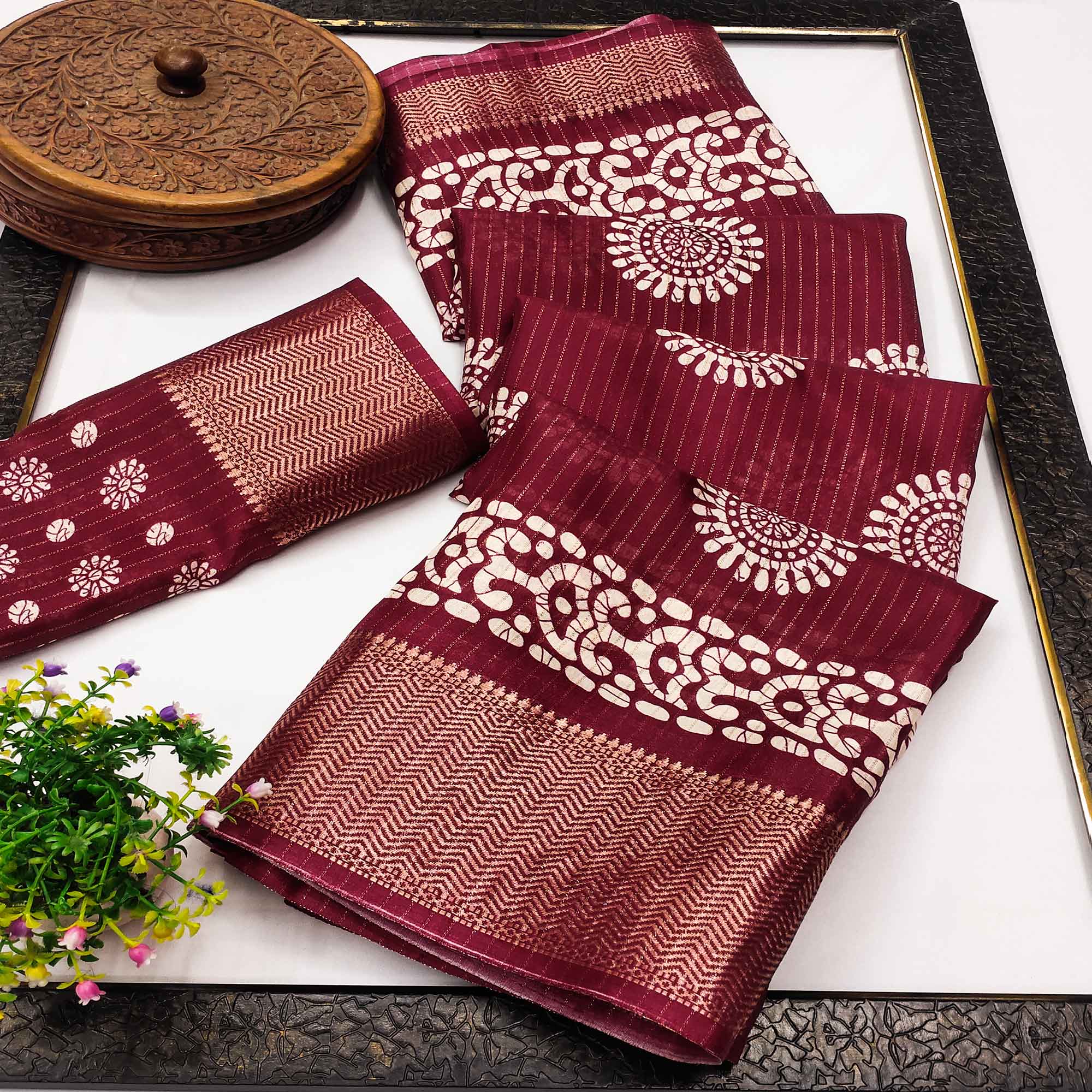 Classic Maroon Dola Silk Saree Adorned with Floral Motifs & Rich Zari Work