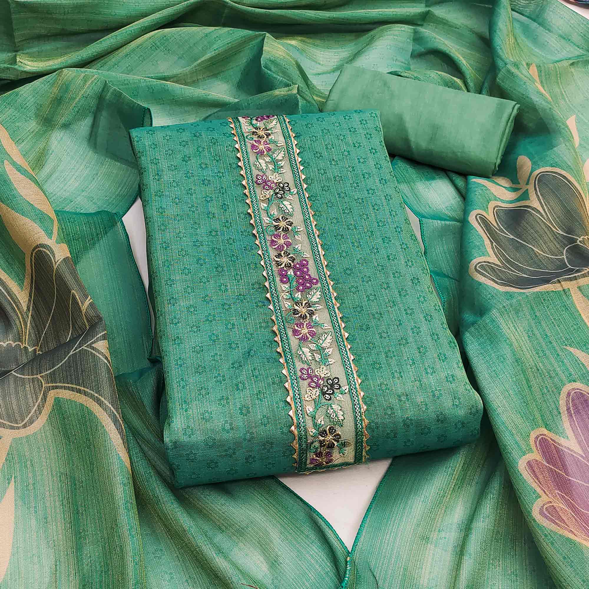 Green Art Silk Dress Material Adorned with Soft Floral Prints for a Regal Ethnic Touch