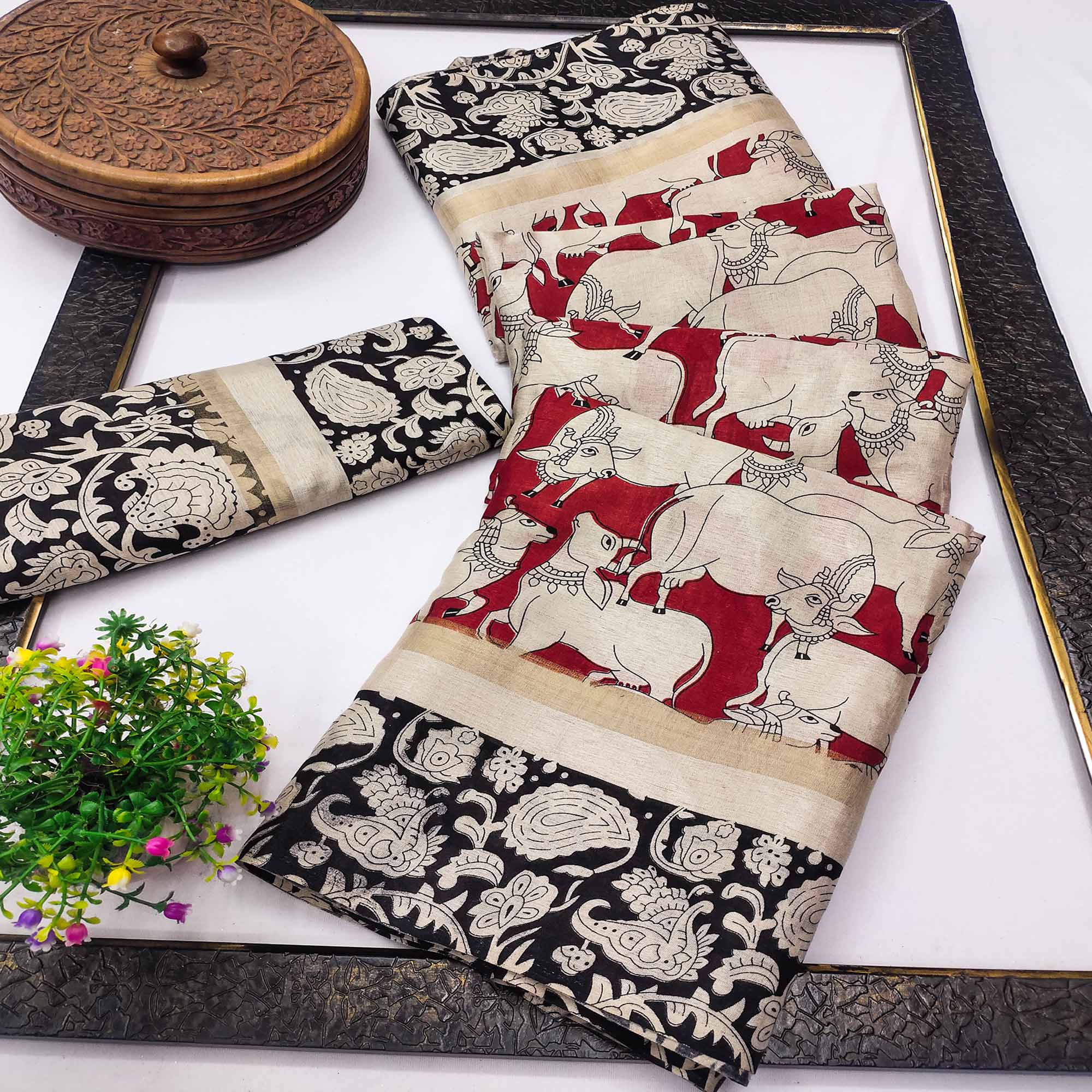 Red & Black Cotton Blend Saree Featuring Artistic Animal And Floral Print Fusion