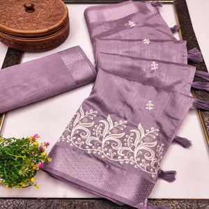 Lavender Art Silk Saree Adorned With Delicate Floral Embroidery & Stylish Tassel Pallu