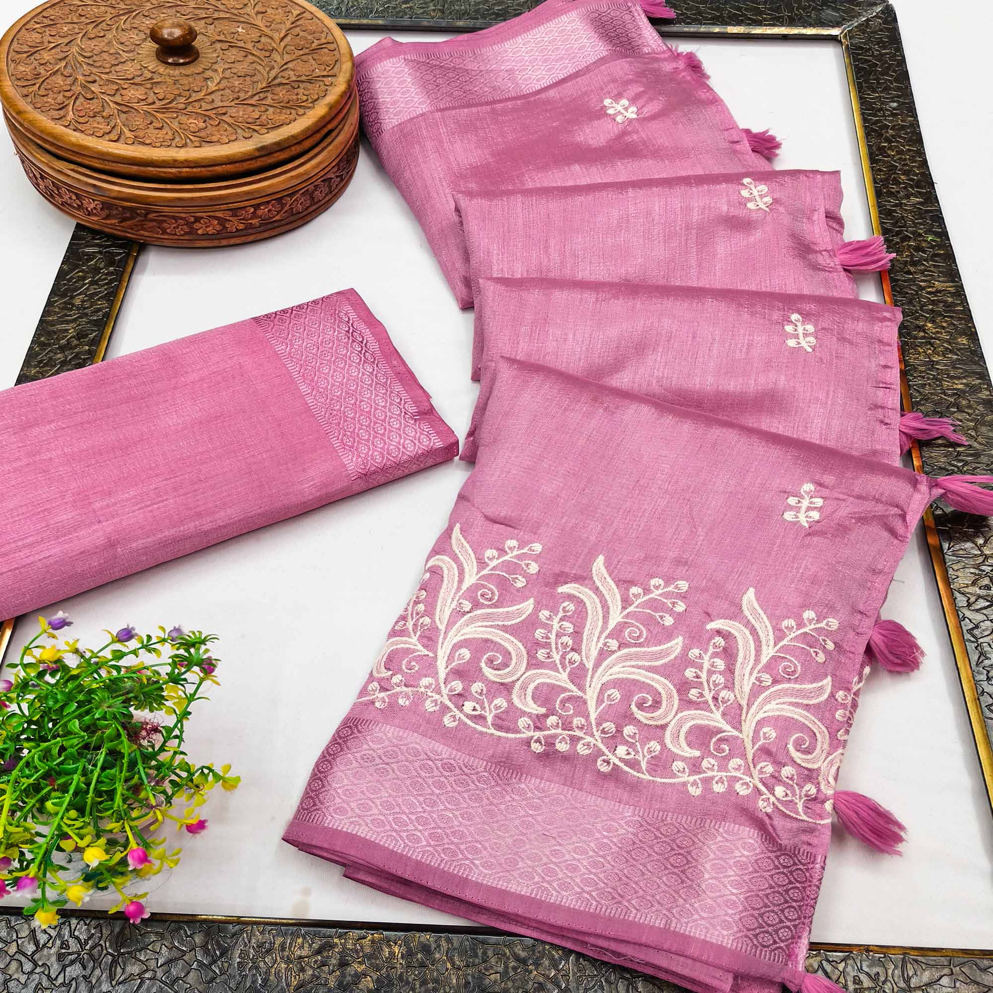 Orchid Pink Art Silk Saree Adorned With Delicate Floral Embroidery & Stylish Tassel Pallu