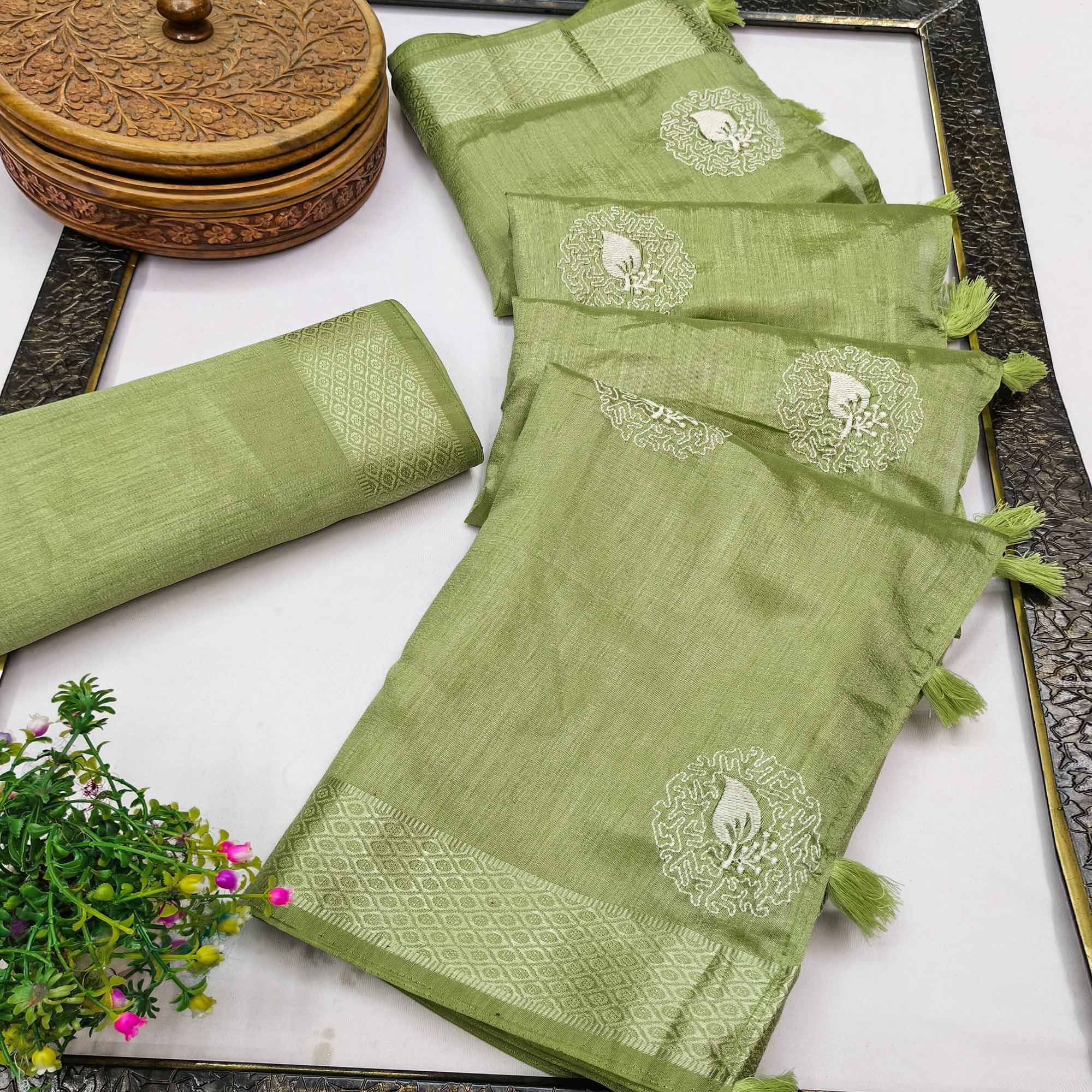 Pista Green Embroidered Art Silk Saree Adorned with Classic Zari Weaving Details