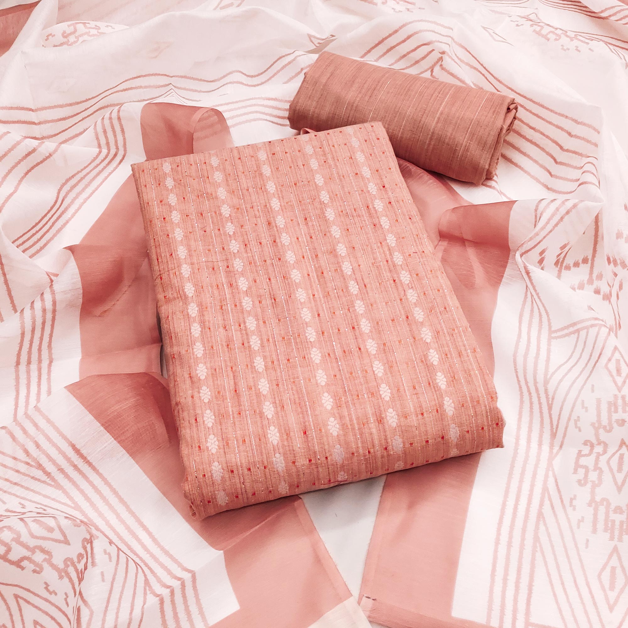 Classic Peach Pure Cotton Dress Material Featuring Intricate Weaving