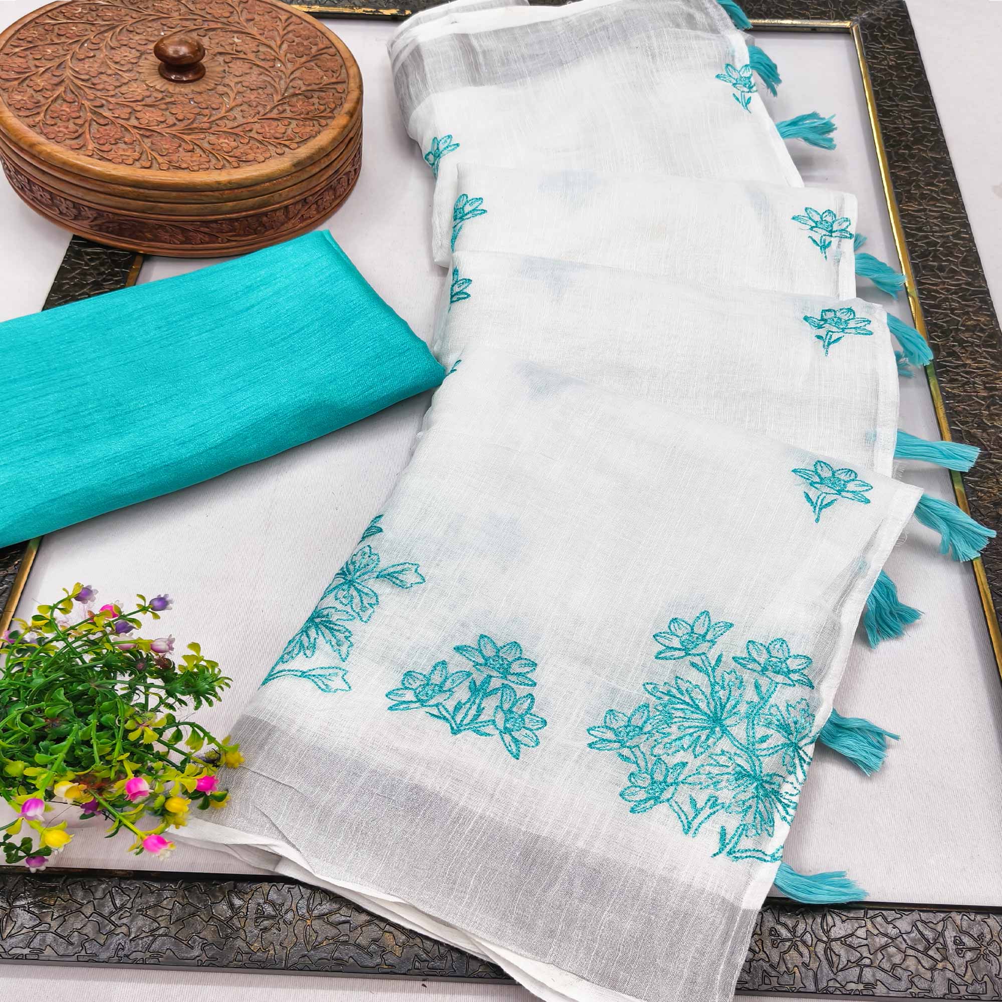 White & Blue Floral Embroidered Linen Saree Perfect for Festive Occasions