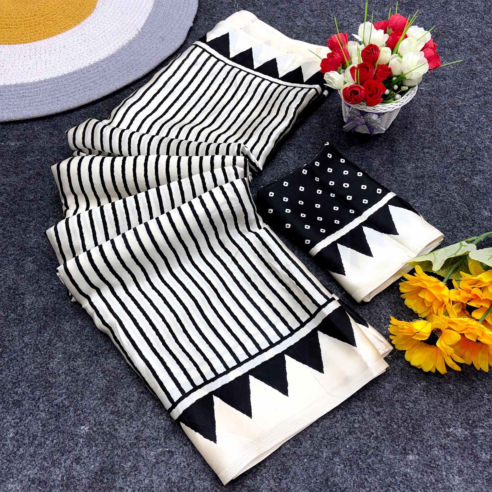 Party Perfect Off White & Black Saree Crafted in Cream Crepe Fabric with Striped Print