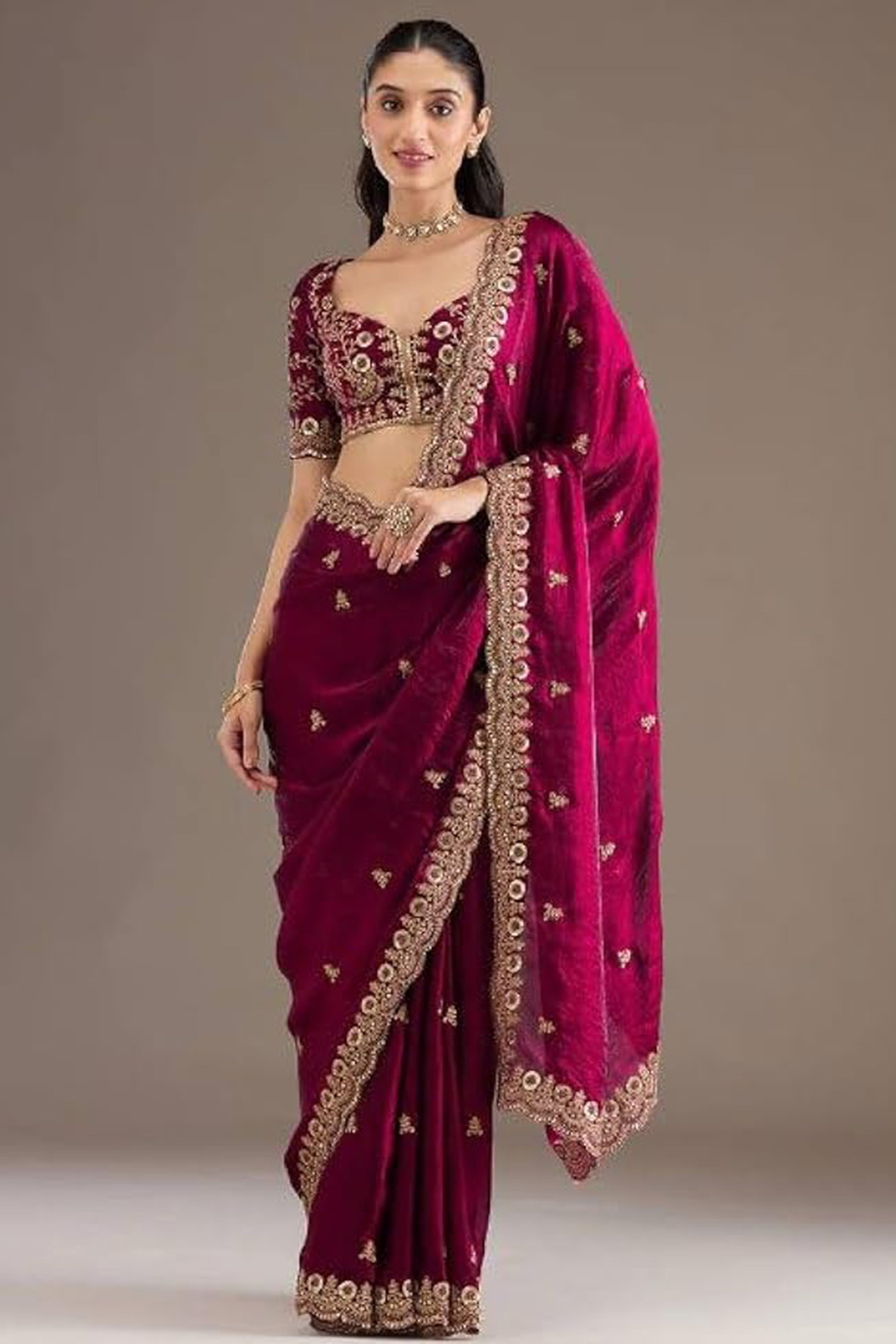 Trendy Rani Pink Fancy Satin Saree Enhanced With Rich Golden Embroidered Design