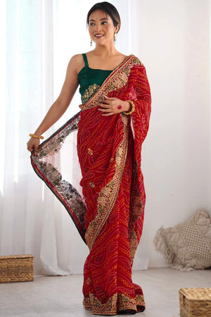 Classic Red Bandhani Print Georgette Saree Enhanced With Intricate Zari Embroidered Border Detailing