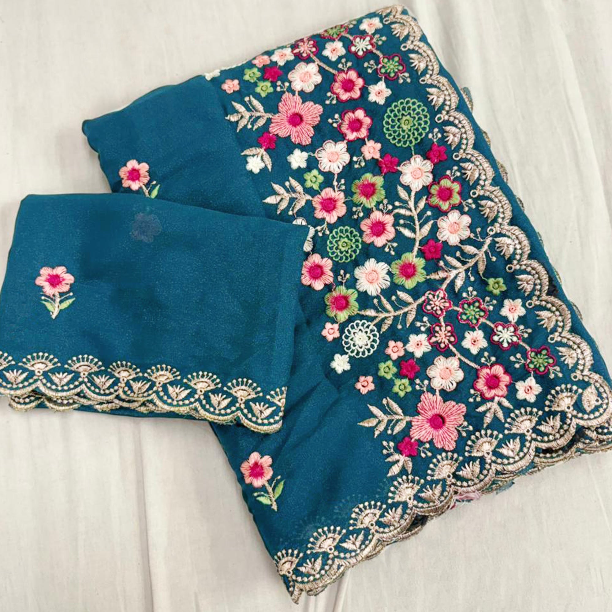 Graceful Morpich Blue Georgette Saree Featuring Exquisite Floral Thread Embroidery Work