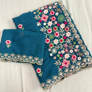 Graceful Morpich Blue Georgette Saree Featuring Exquisite Floral Thread Embroidery Work