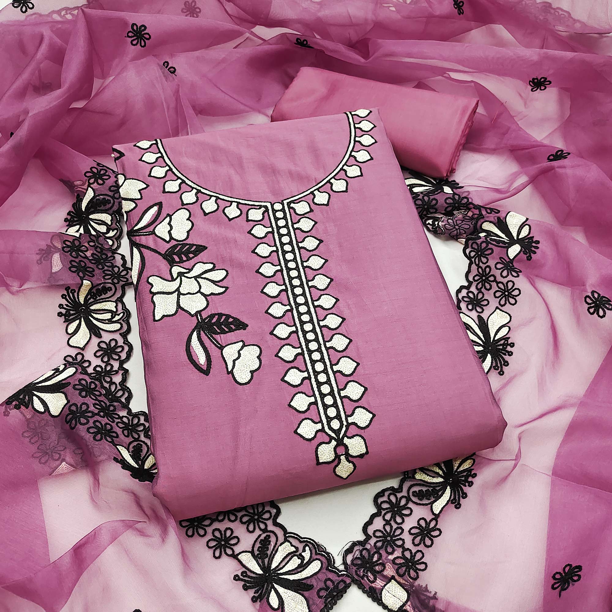 Graceful Pale Magenta Floral Viscose Dress Material Enhanced With Intricate Thread Embroidery Work