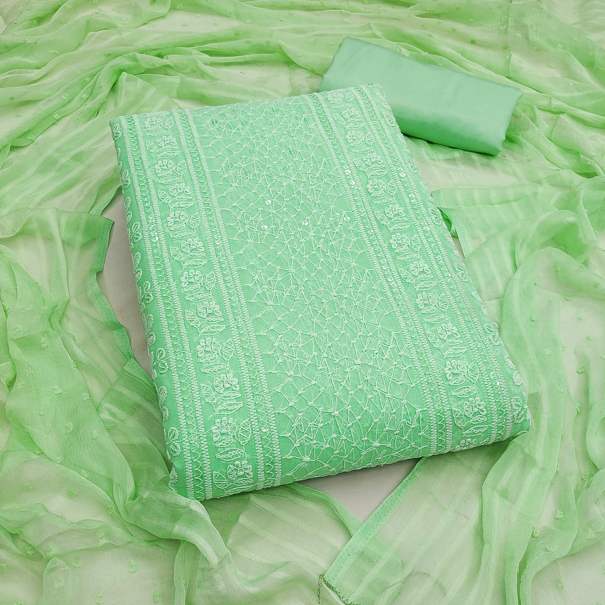 Elegant Green Floral Embroidered Georgette Dress Material With Delicate Sequins Accents