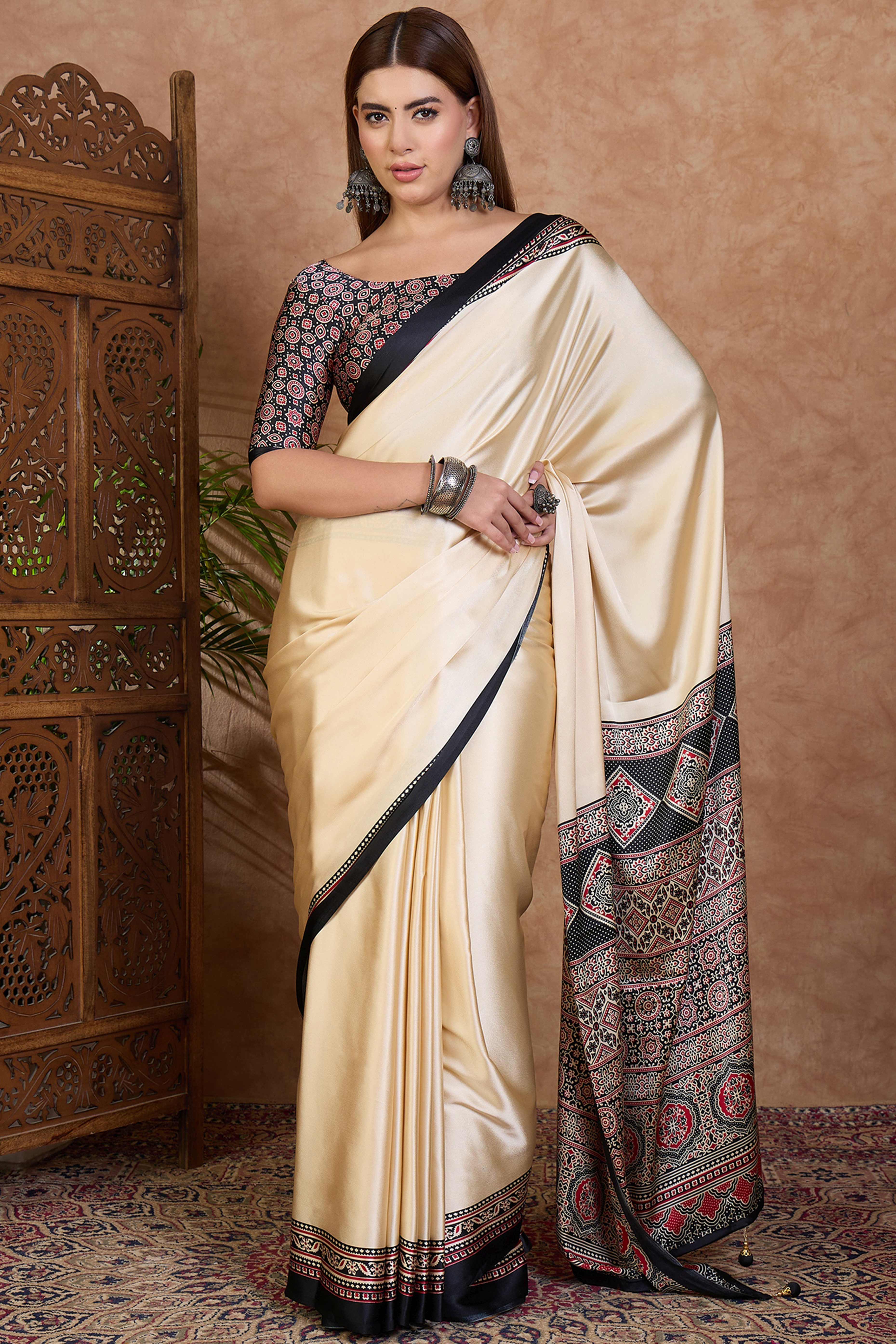 Cream & Black Modal Satin Saree Featuring a Solid Base and Artisanal Ajrakh Pallu