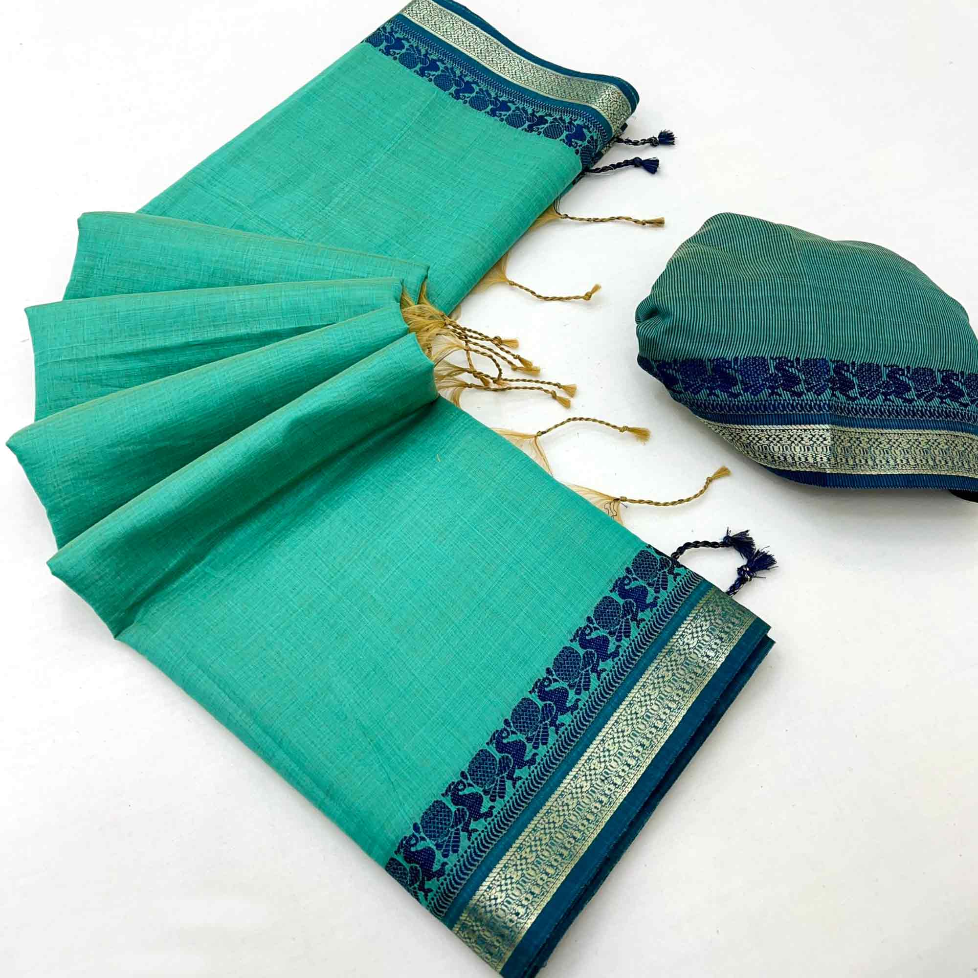 Turquoise Pure Handloom Silk Saree with an Elegantly Woven Jacquard Border