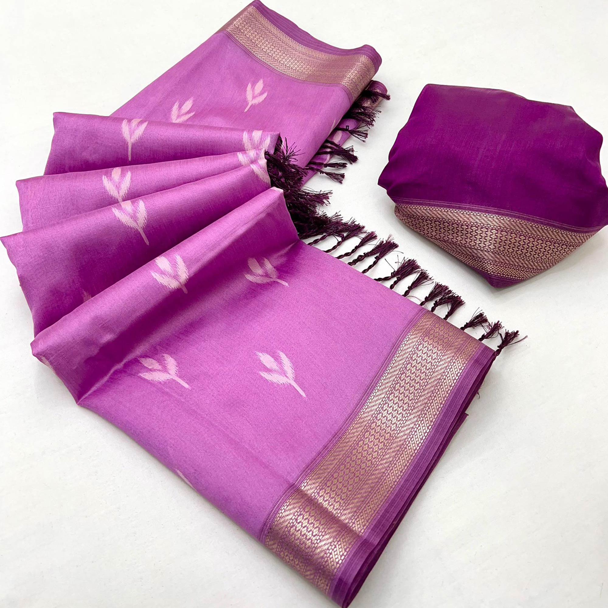Purple Ikkat Style Rayon Silk Saree with Luxurious Zari Border and Delicate Tassels