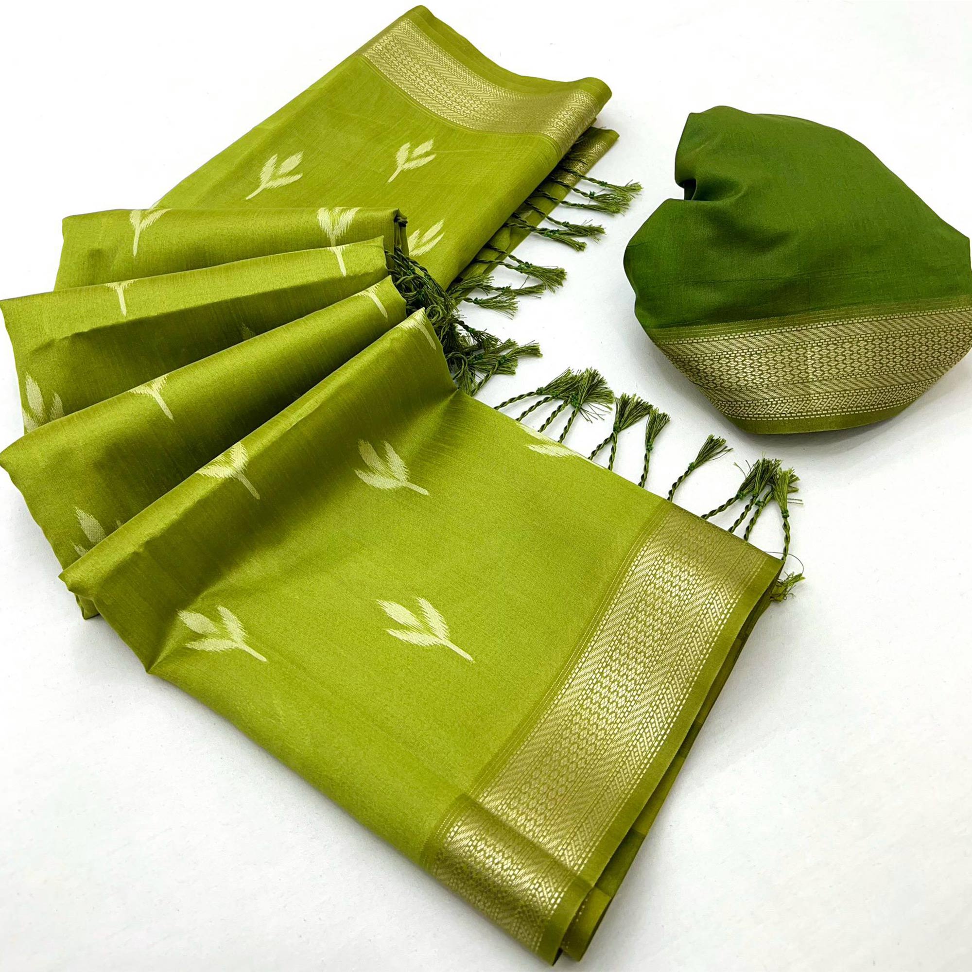 Green Ikkat Style Rayon Silk Saree with Luxurious Zari Border and Delicate Tassels