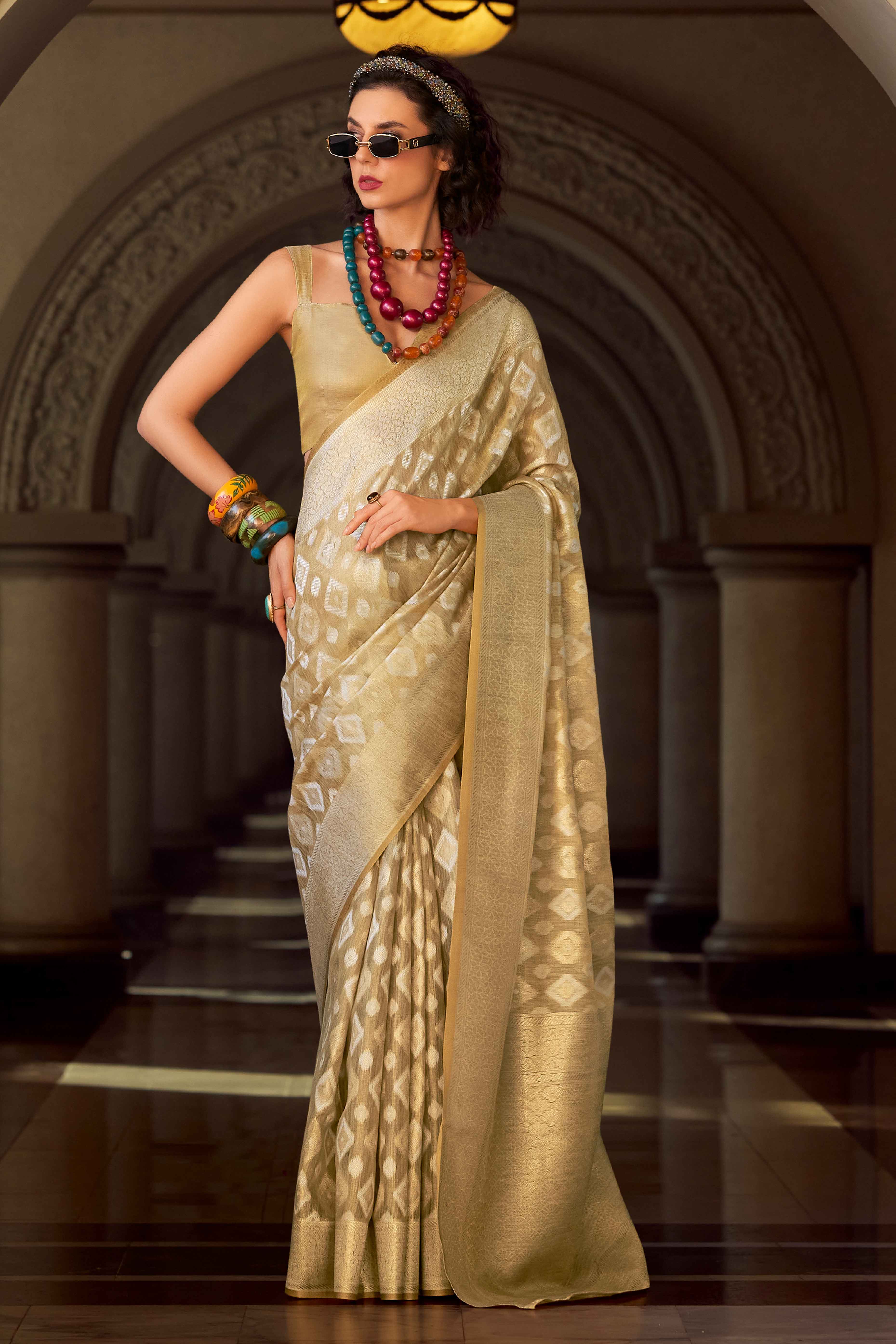 Chikoo Geometric Pattern Woven Tissue Silk Saree
