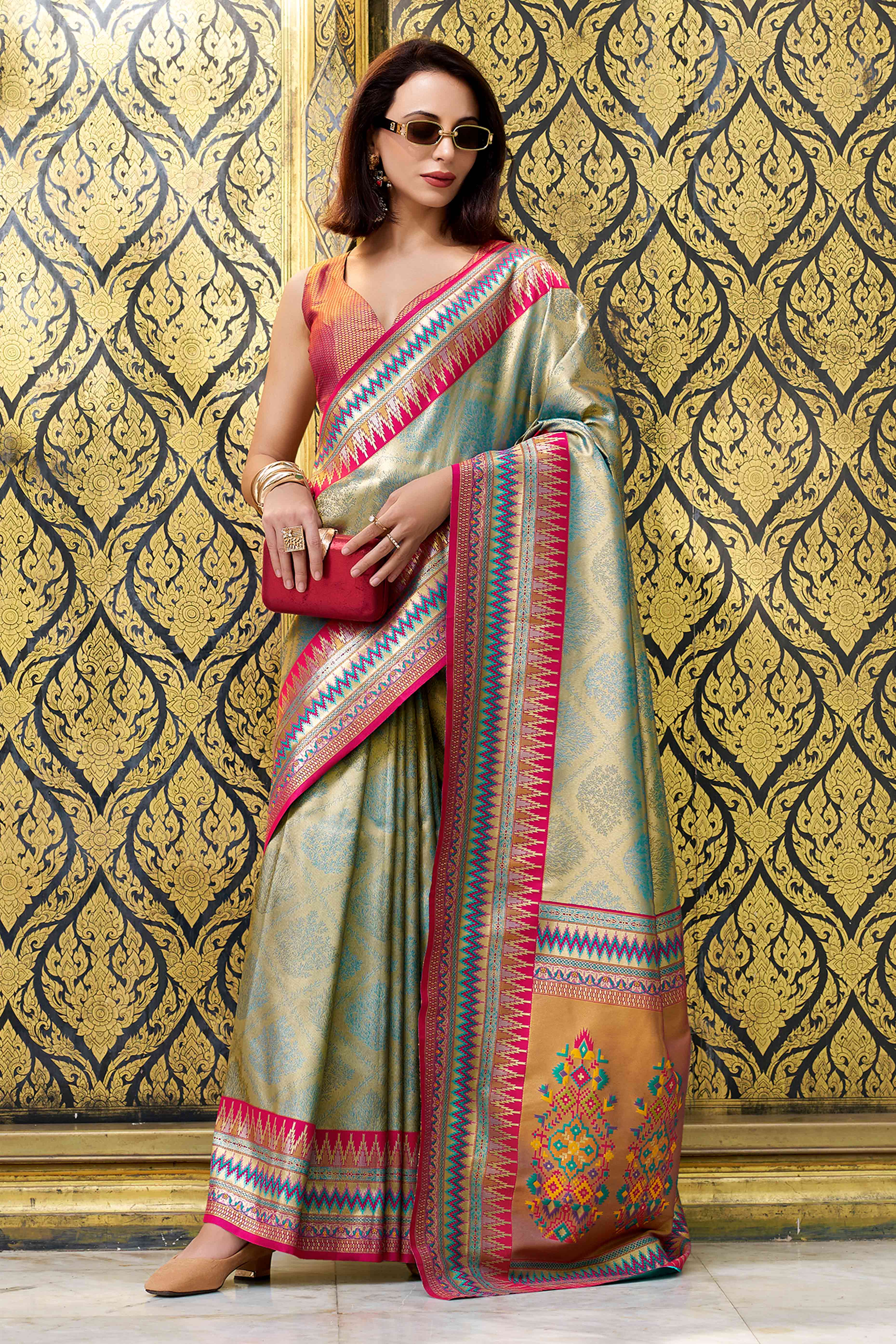 Teal Zari Weaving Tissue Silk Saree