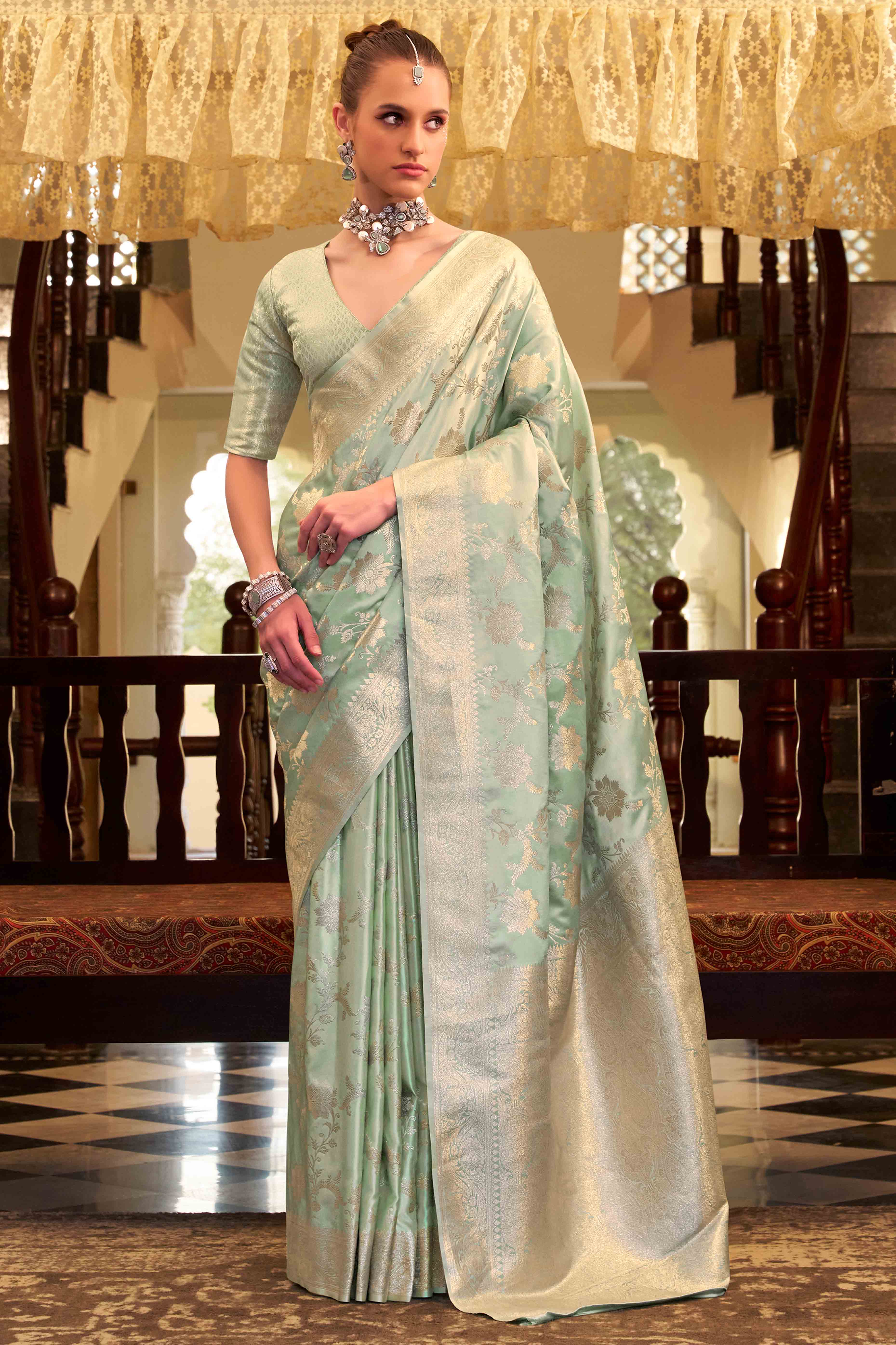 Sea Green Soft Satin Saree Featuring Exquisite Zari Weaving Work