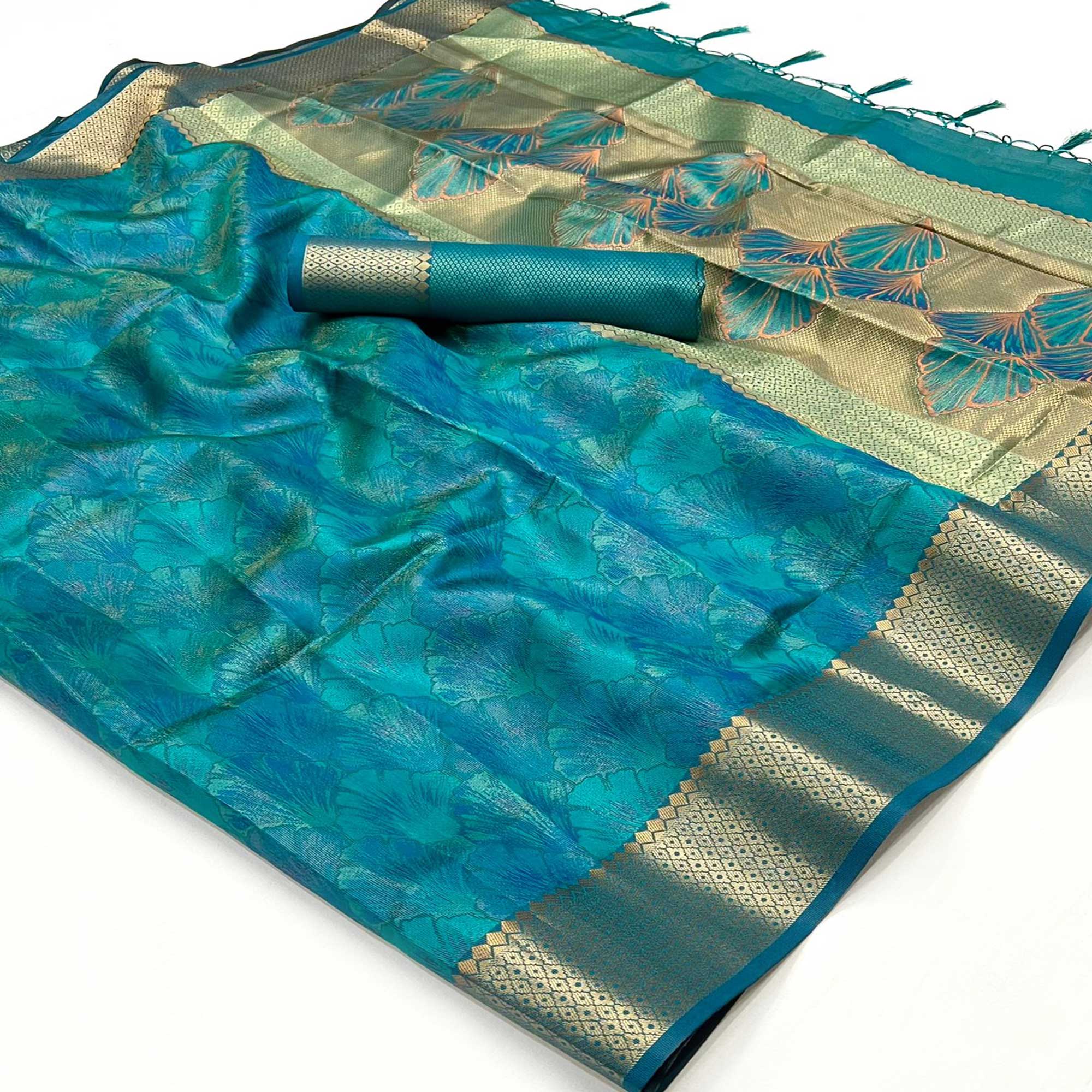 Teal Zari Woven Organza Saree Tassels