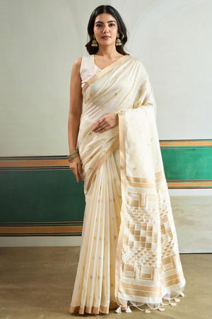Classic Offwhite Tussar Silk Saree Showcasing Rich Geometric Weaving & Trendy Tassel Pallu