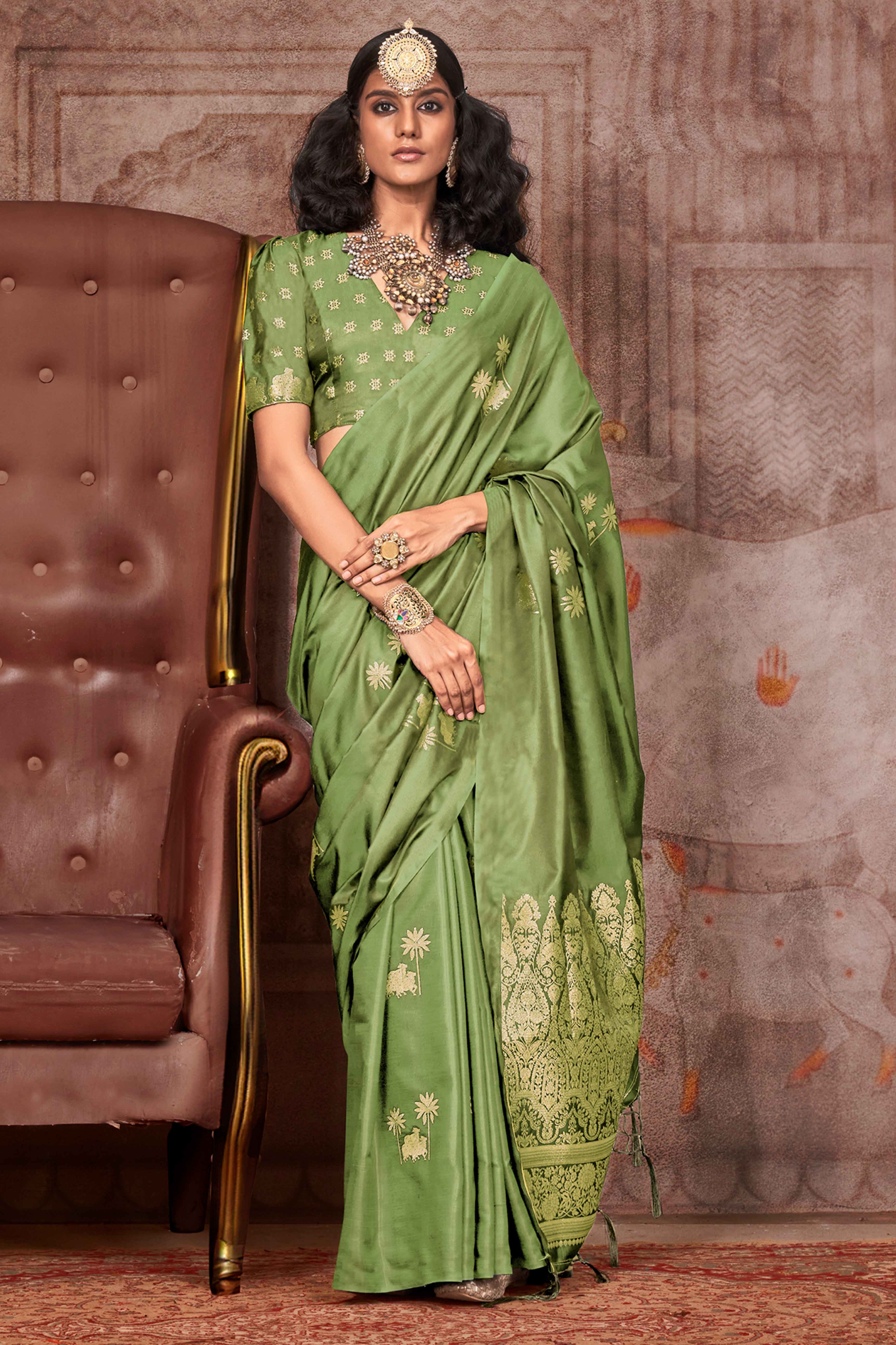 Green Satin Silk Saree with Exquisite Floral Zari Weaving & Graceful Tassel Detailing