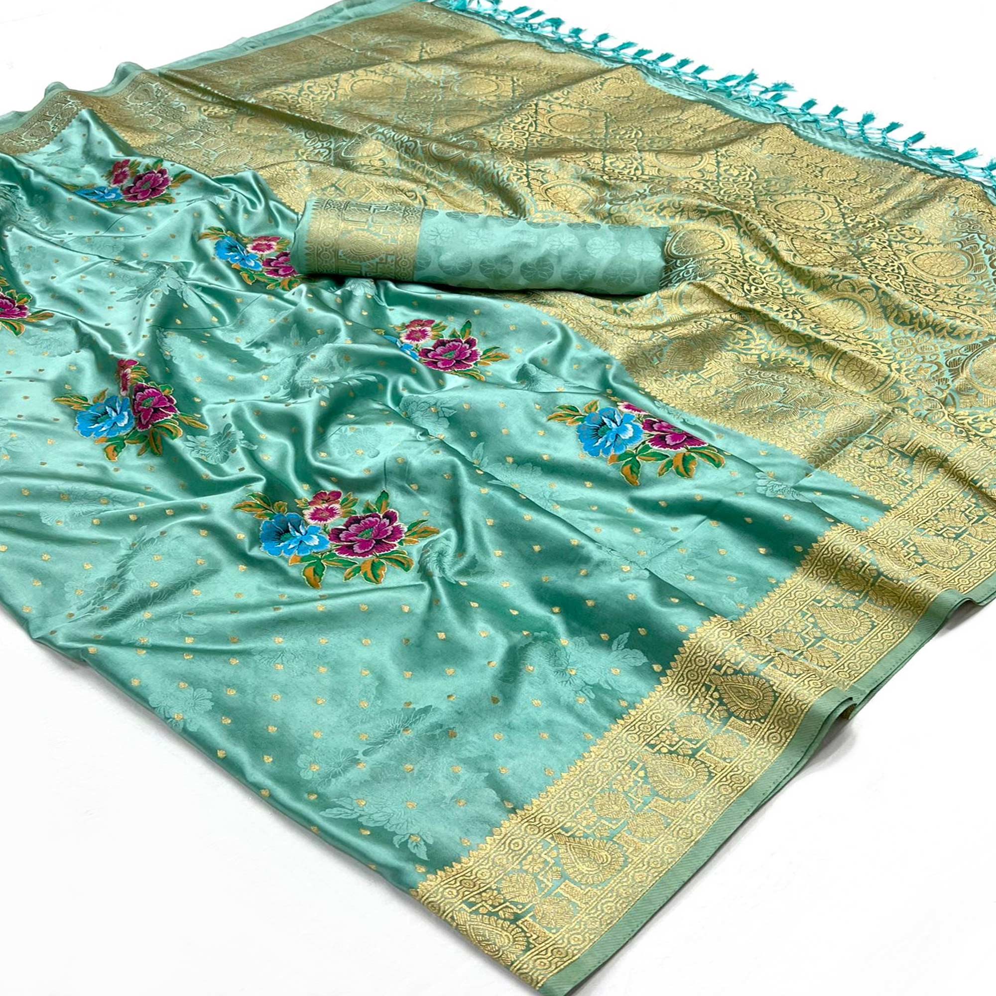 Light Turquoise Floral Woven Satin Saree With Tassels