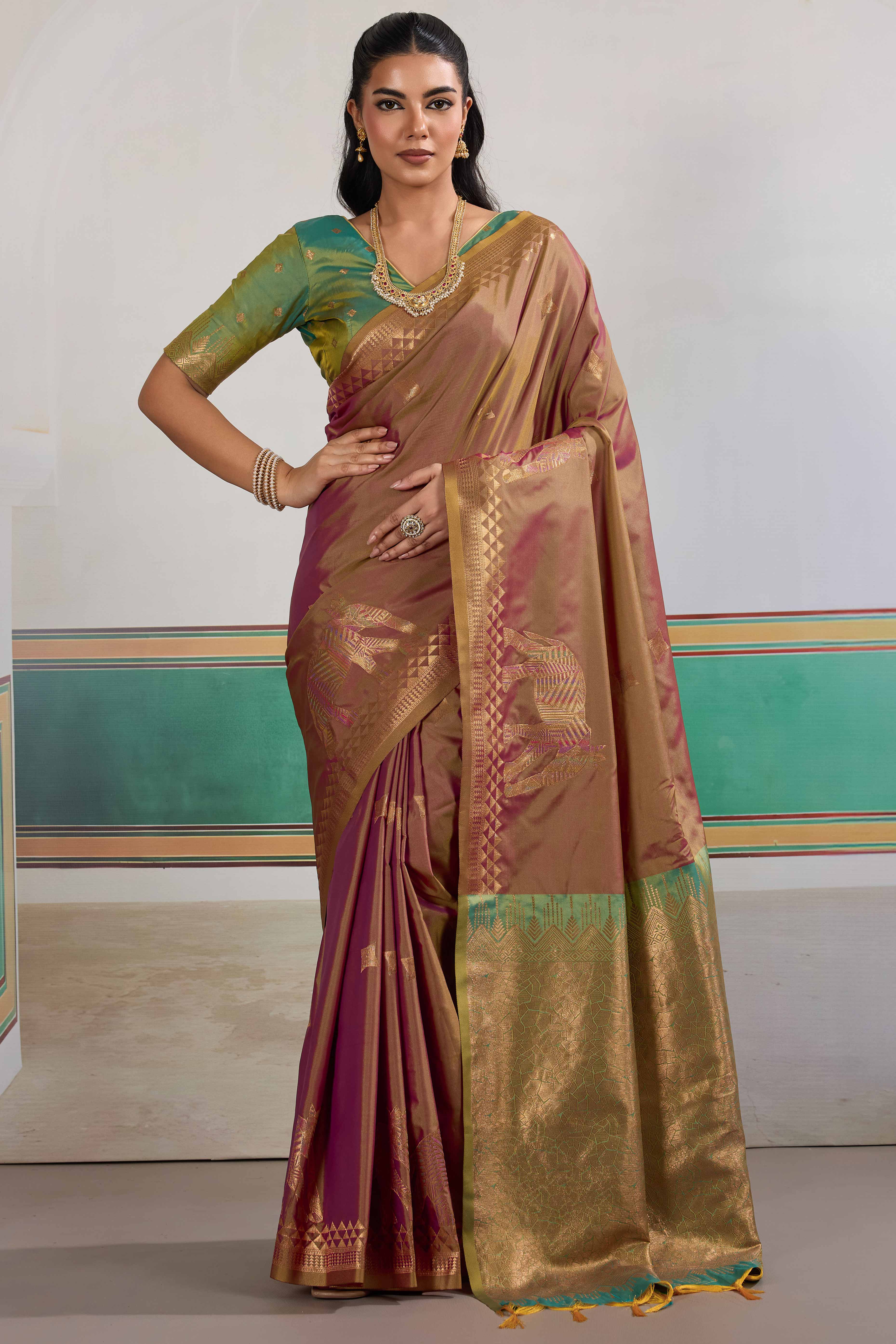 Traditional Brown Pure Silk Saree Featuring Elephant Motif Zari Weaving & Tassel Pallu